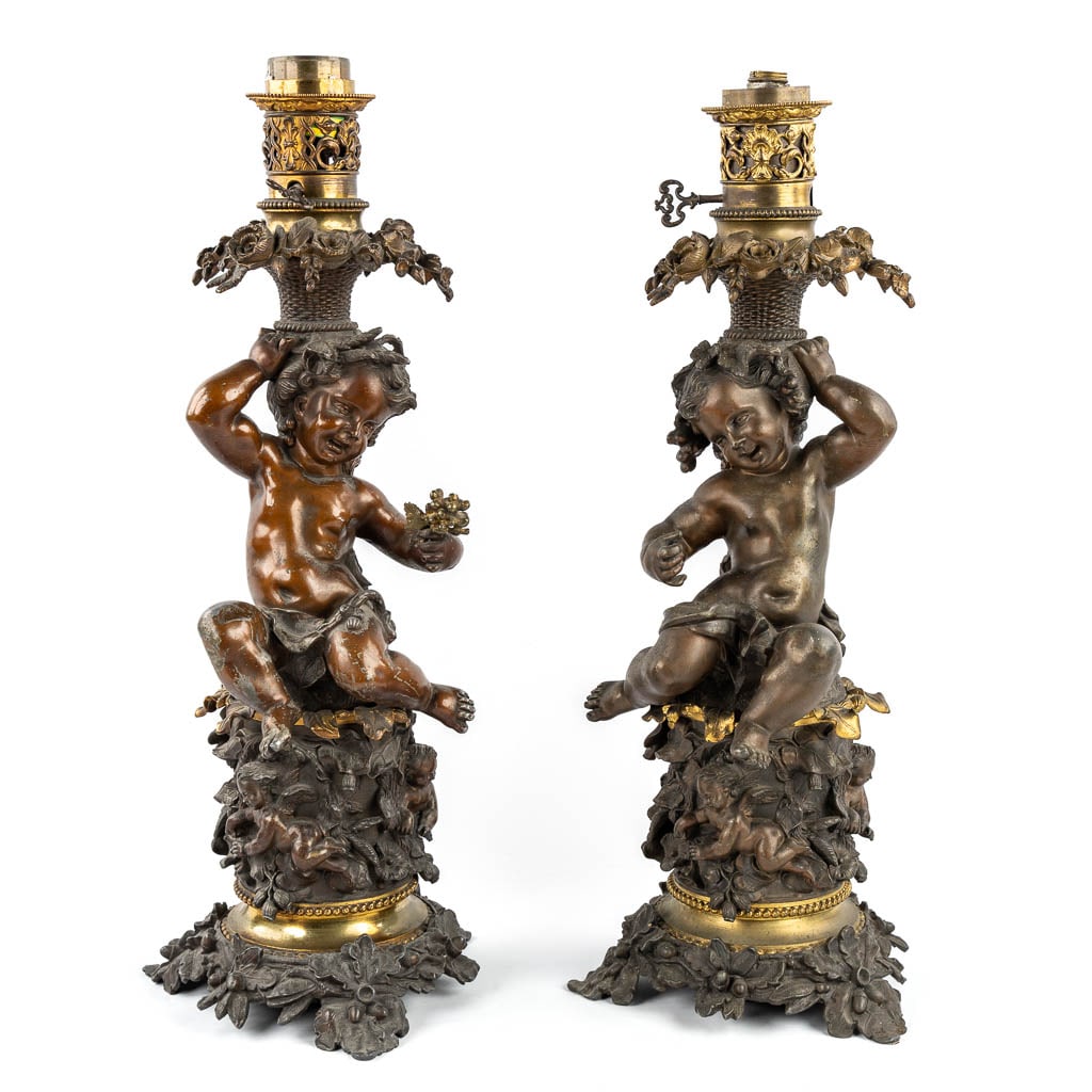 A Pair of Oil Lamps decorated with Putti, patinated spelter. Circa 1900 (1 of 10)