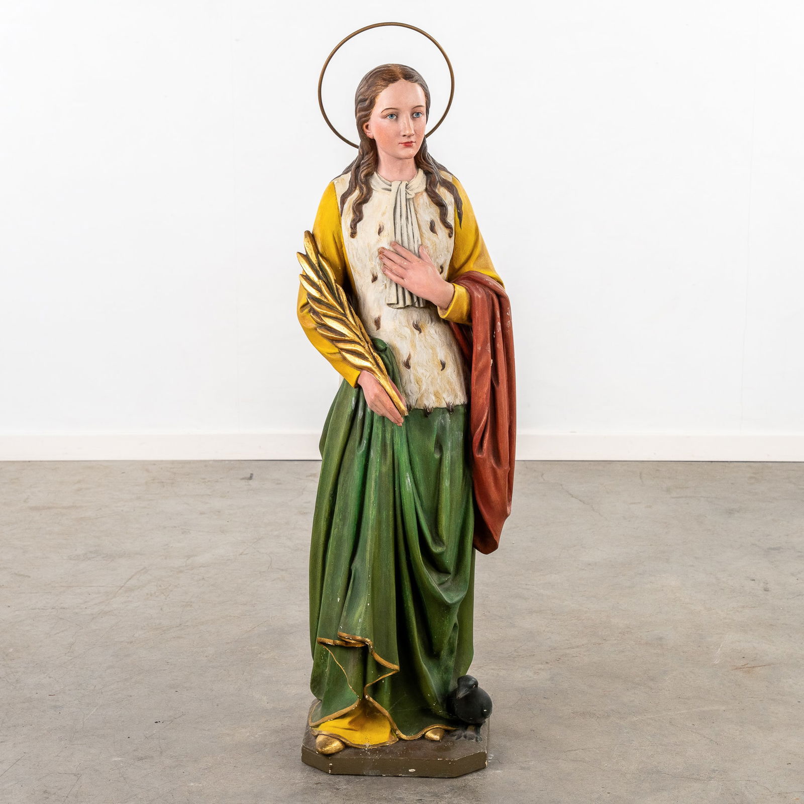 An antique figurine of Saint Godelive with a Raven, polychrome plaster. (1 of 9)