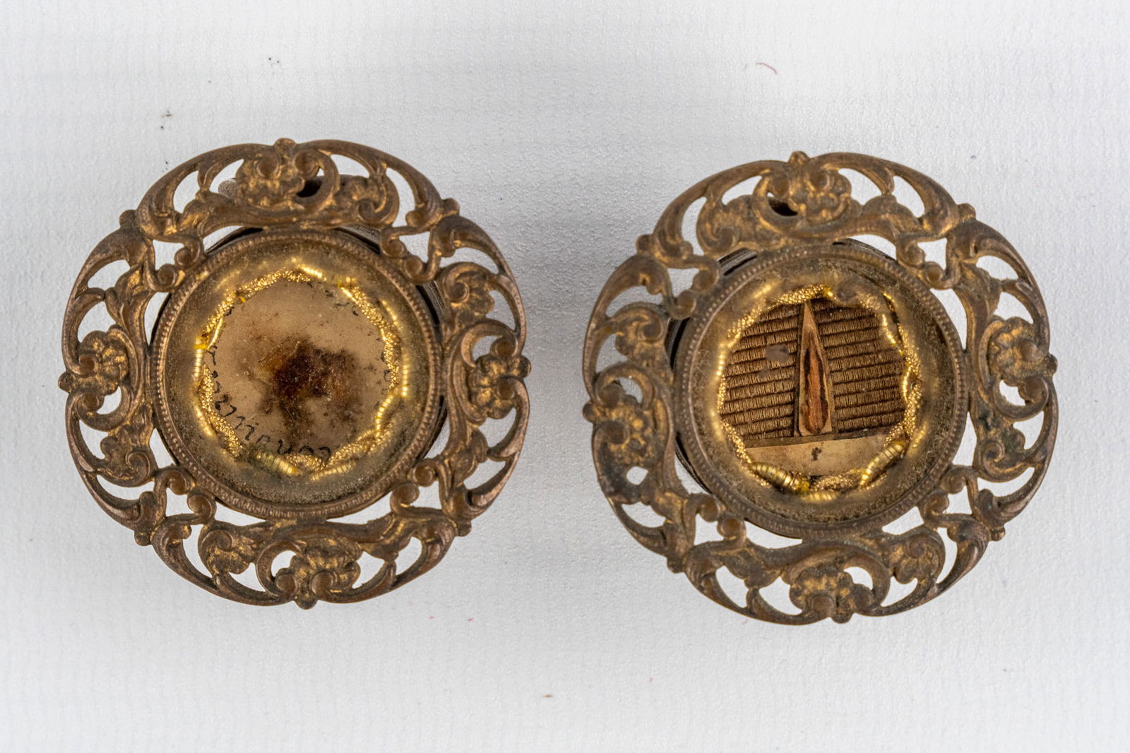 A pair of sealed theca with relics: 'Ex Spinea Corona' & 'Ex Veste Inconsutili DNJC'. (1 of 6)