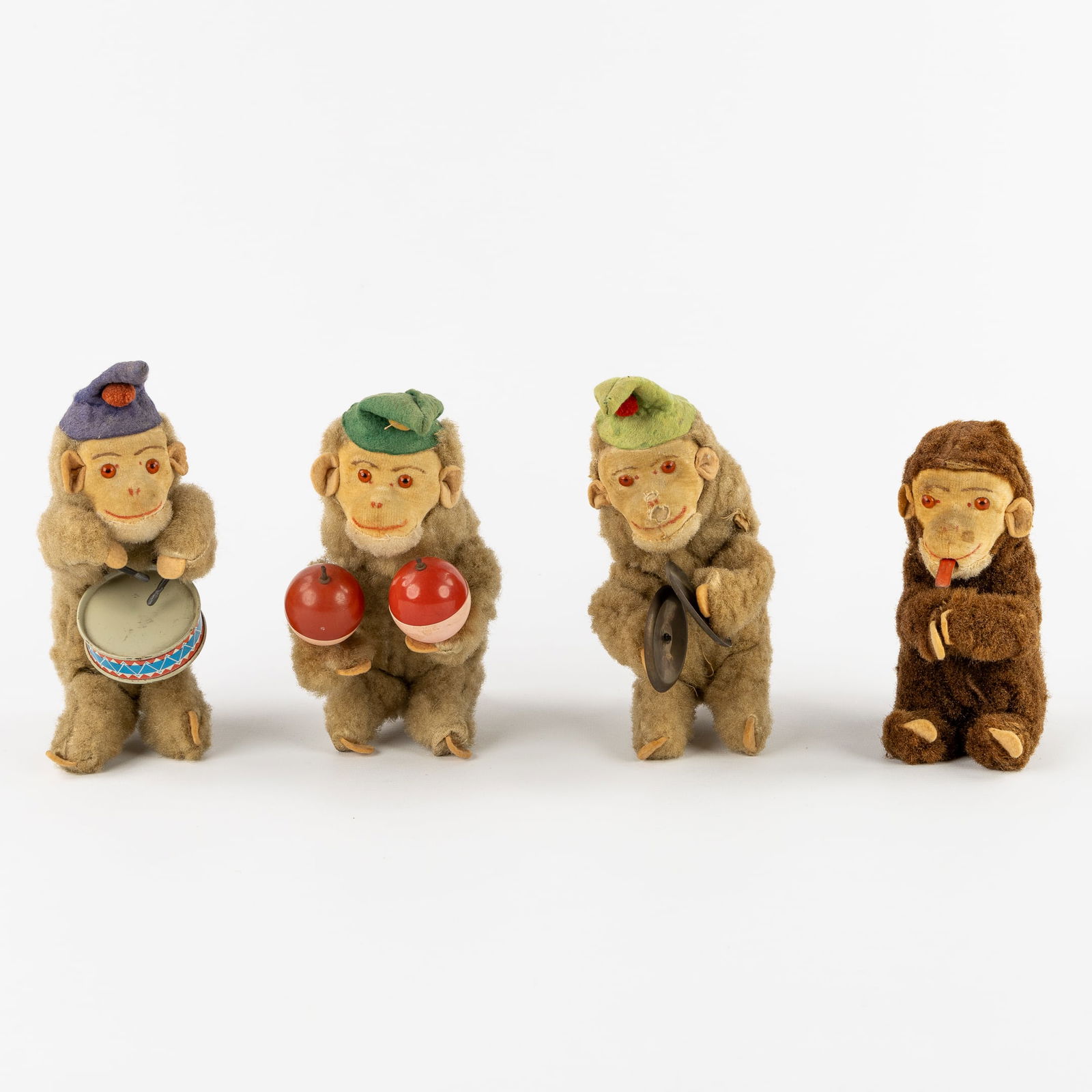 A Collection of four Toy Monkeys, Max Carl Original, Germany, Clockwork Automation, Automata, Circa: A Collection of four Toy Monkeys, Max Carl Original, Germany, Clockwork Automation, Automata, Circa 1950 Drum Monkey Cymbal Monkey Maraca Monkey Monkey with tongue stuck out Mohair Not mark
