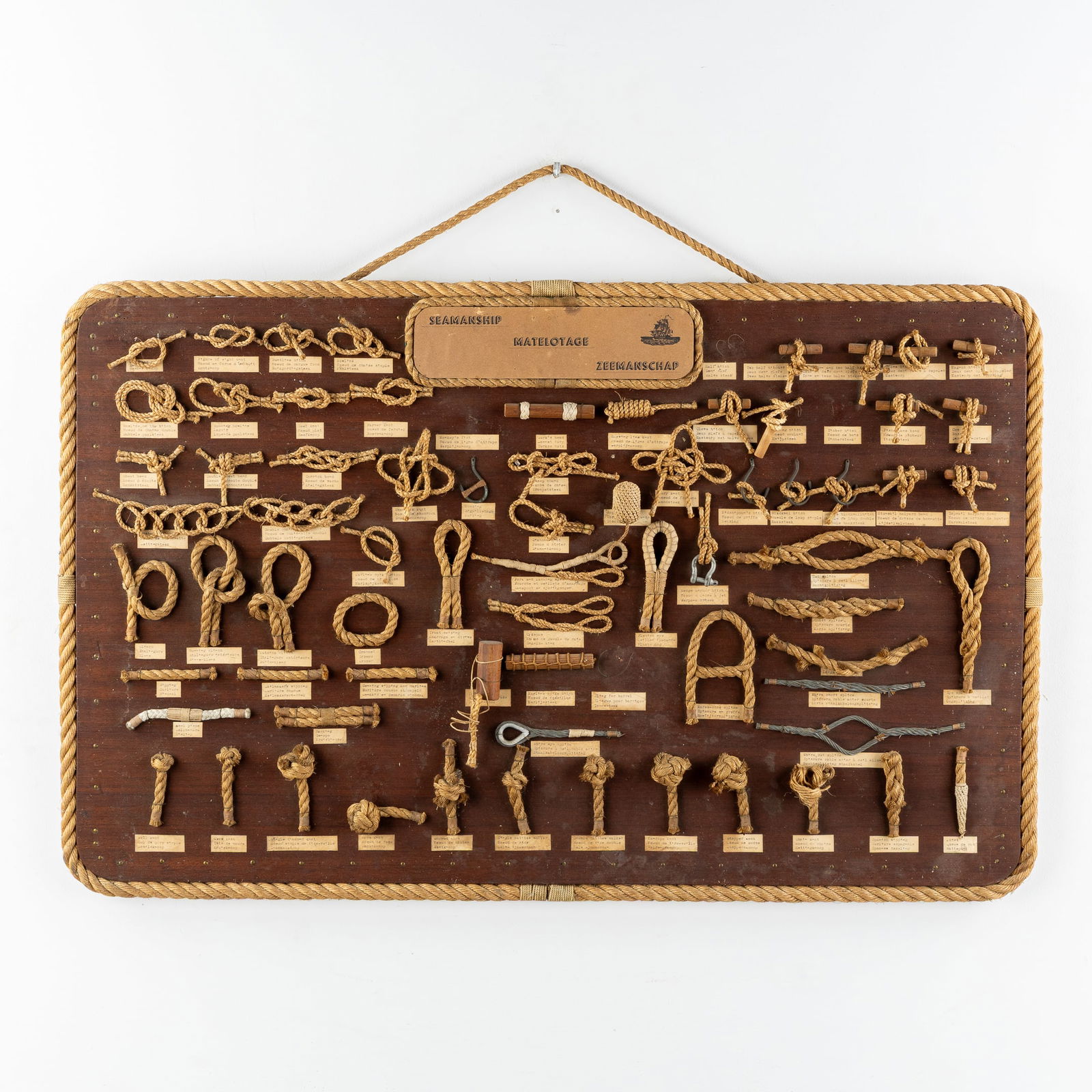Seamanship, a Frame with Sailor's Knots.: Seamanship, a Frame with Sailor's Knots. 'Matelotage - Seamanship - Zeemanschap' Frame with 75 sailor's knots, mounted on a wooden panel.