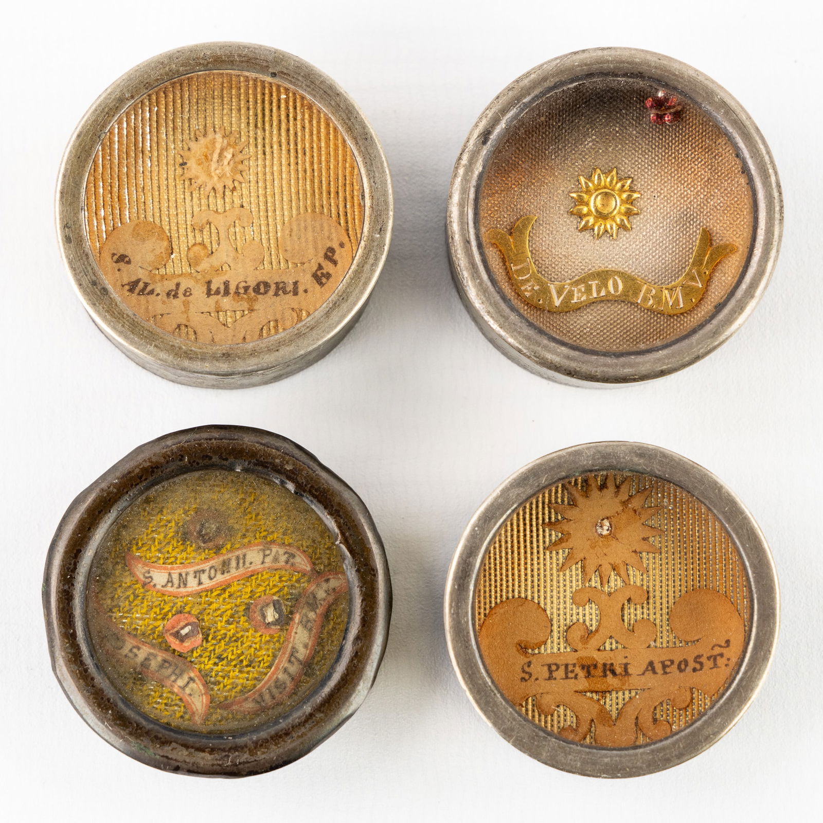 Four sealed theca with relics, Apostle Peter, The Virgin Mary and others.: Four sealed theca with relics, Apostle Peter, The Virgin Mary and others. - S. Petri, Apost - Saint Peter, Apostle. - De Velo BMV - From the veil of Beata Maria Virginis - The Virgin Mary. - S. Alph.