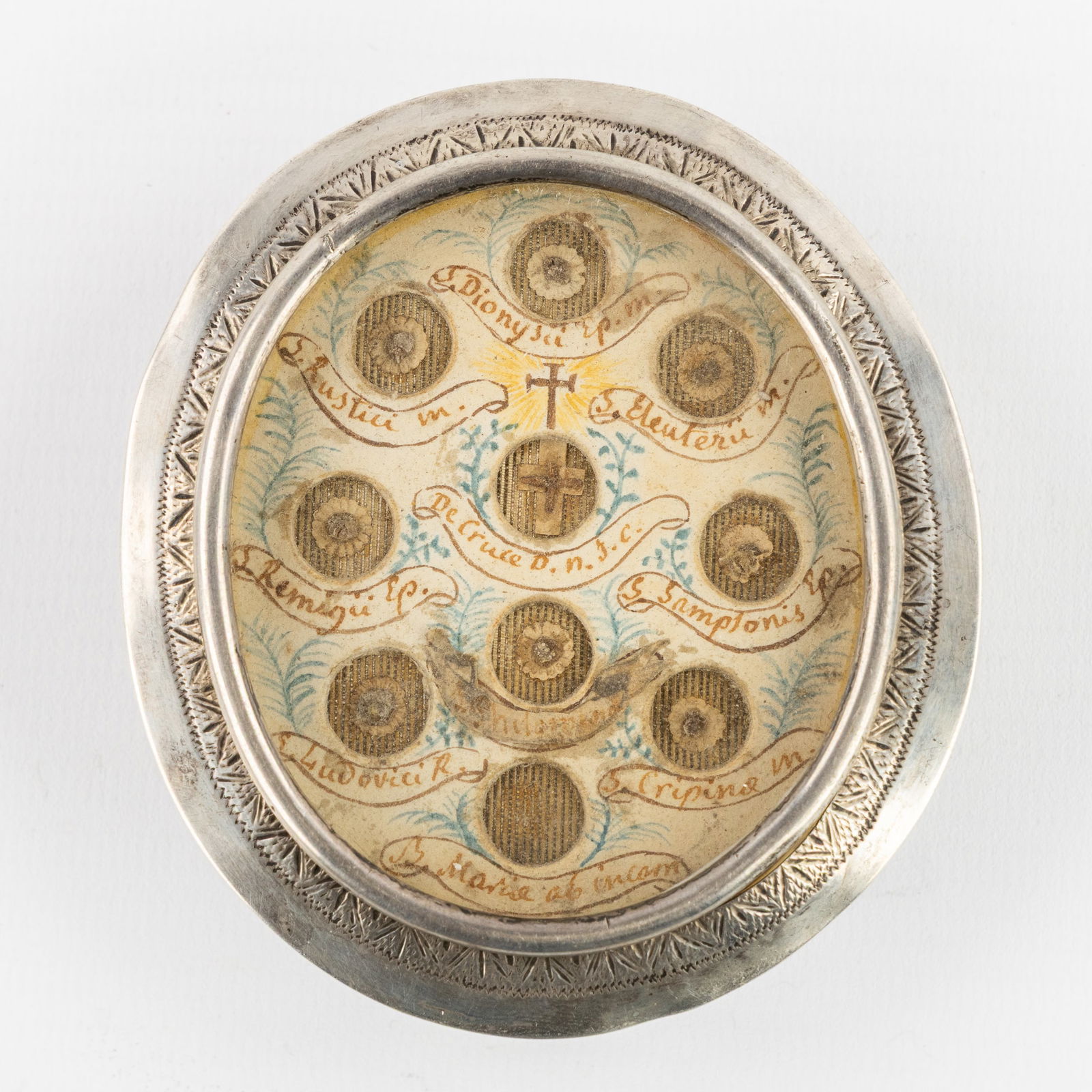 A large oval and slealed theca with 10 relics, The True Cross and Saints. (1 of 2)