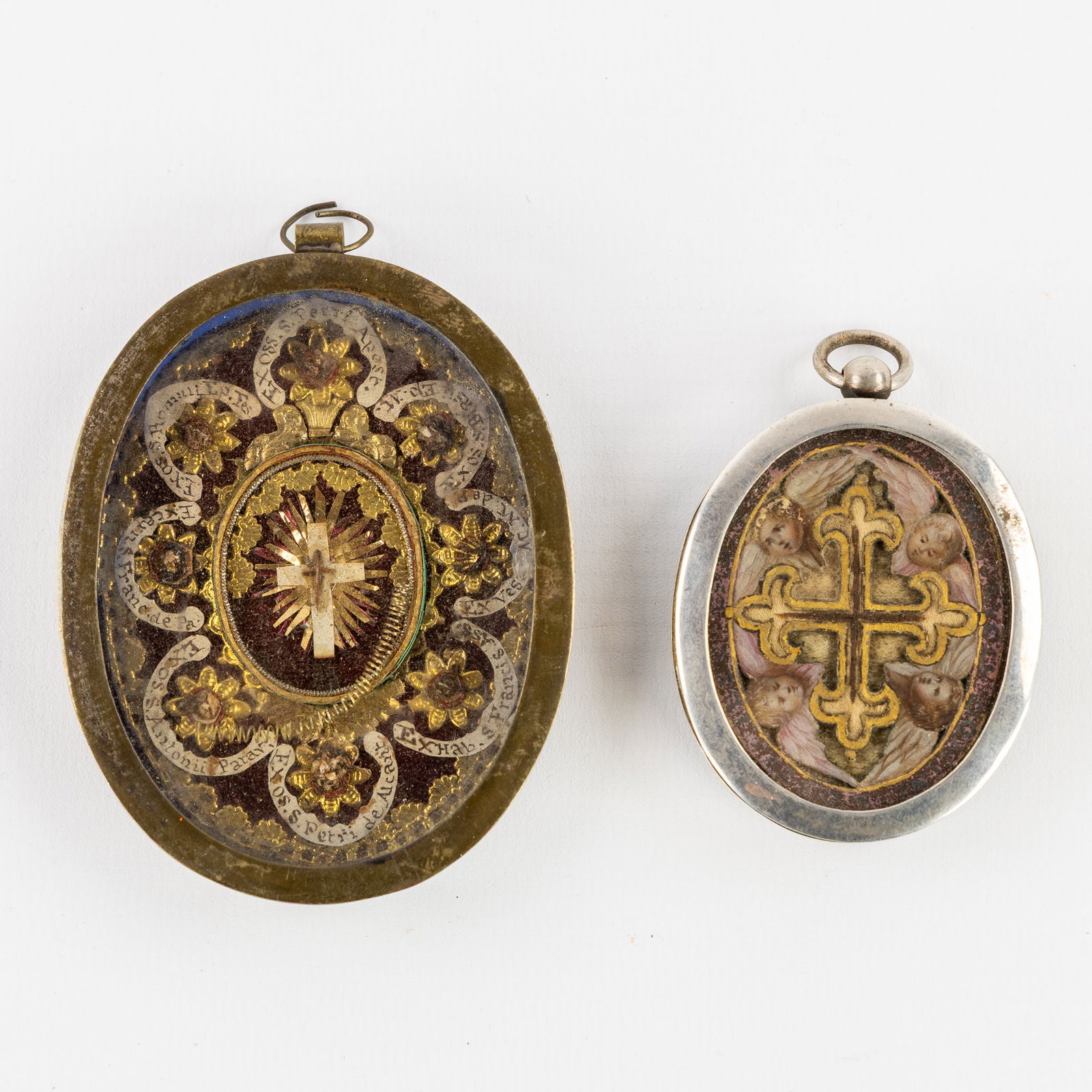 Two antique and sealed pendants with relics of the True Cross, Apostles and Saints. (1 of 5)