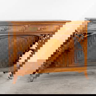 A Sideboard or Dresser, Art Nouveau.: A Sideboard or Dresser, Art Nouveau. Mounted with brass fittings. Dimensions:(W:140 x H:104,5 x L:60 cm)