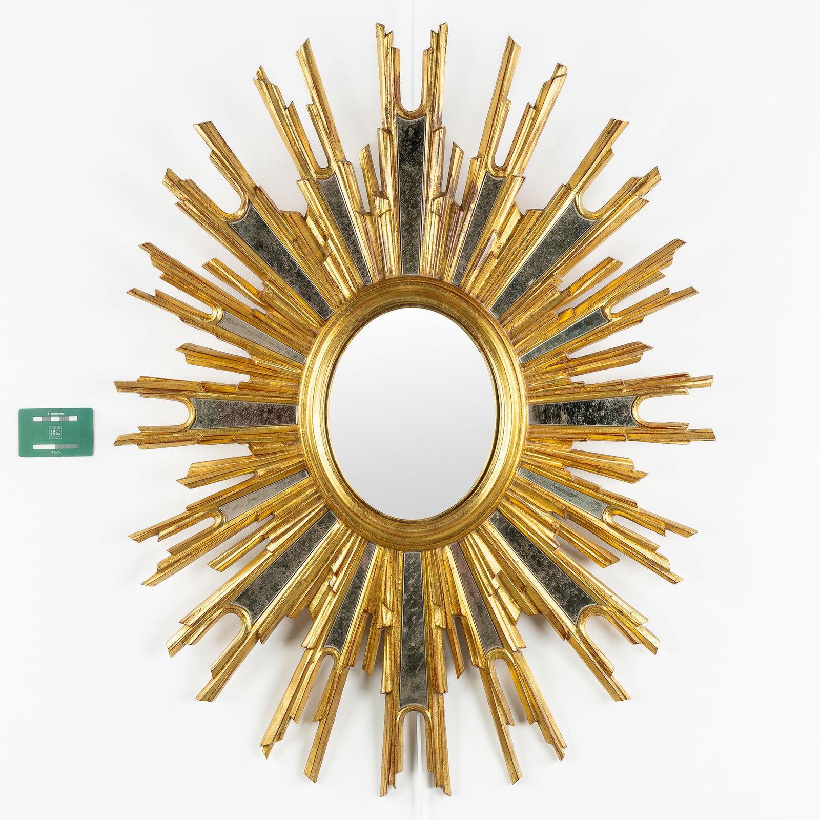 A Large Oval Sunburst Mirror, Sculptured and Gilded Wood, Convex Mirror. (1 of 5)