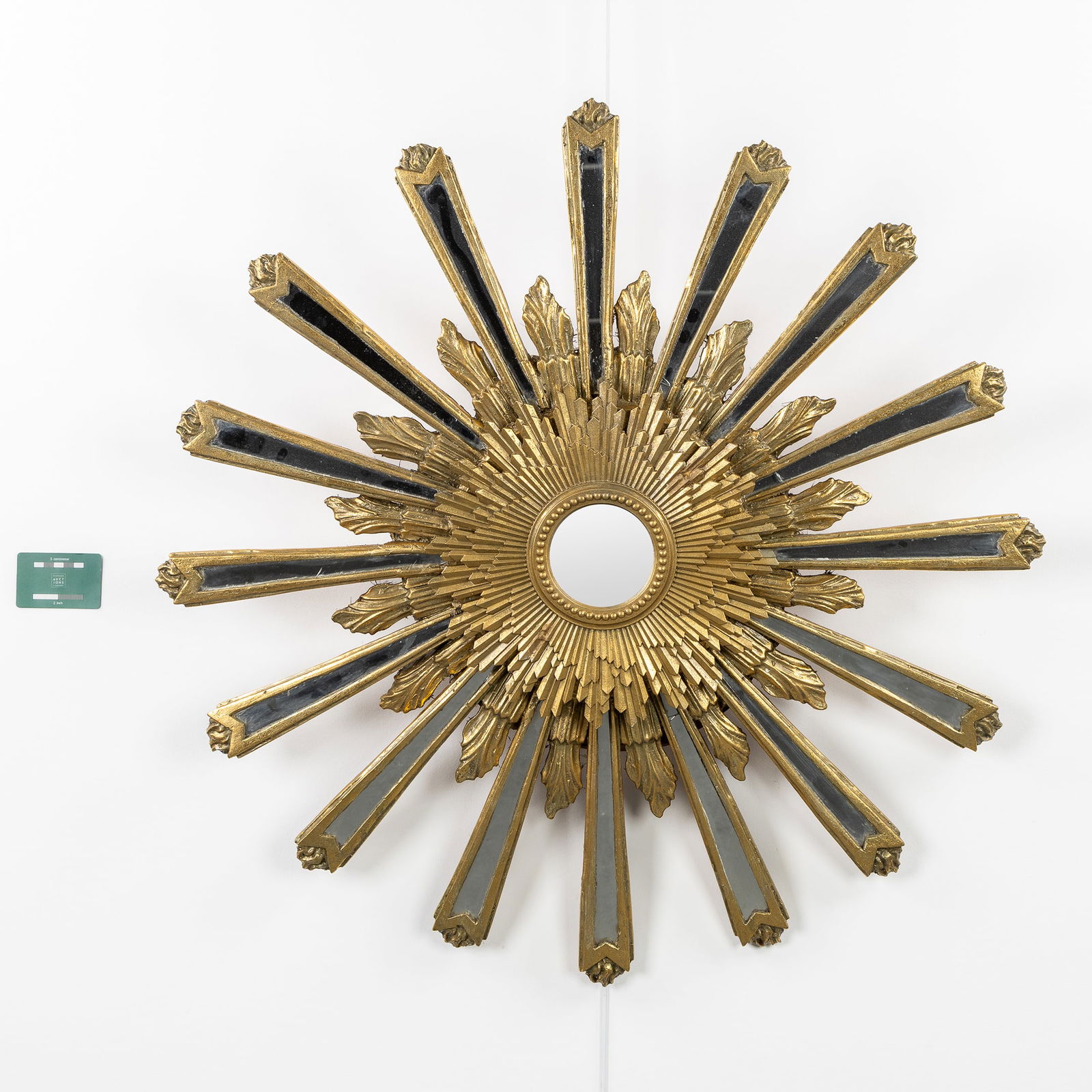 A mid-century Sunburst mirror, wood finished with stucco and rays with mirrors. Circa 1960-1970. (1 of 6)