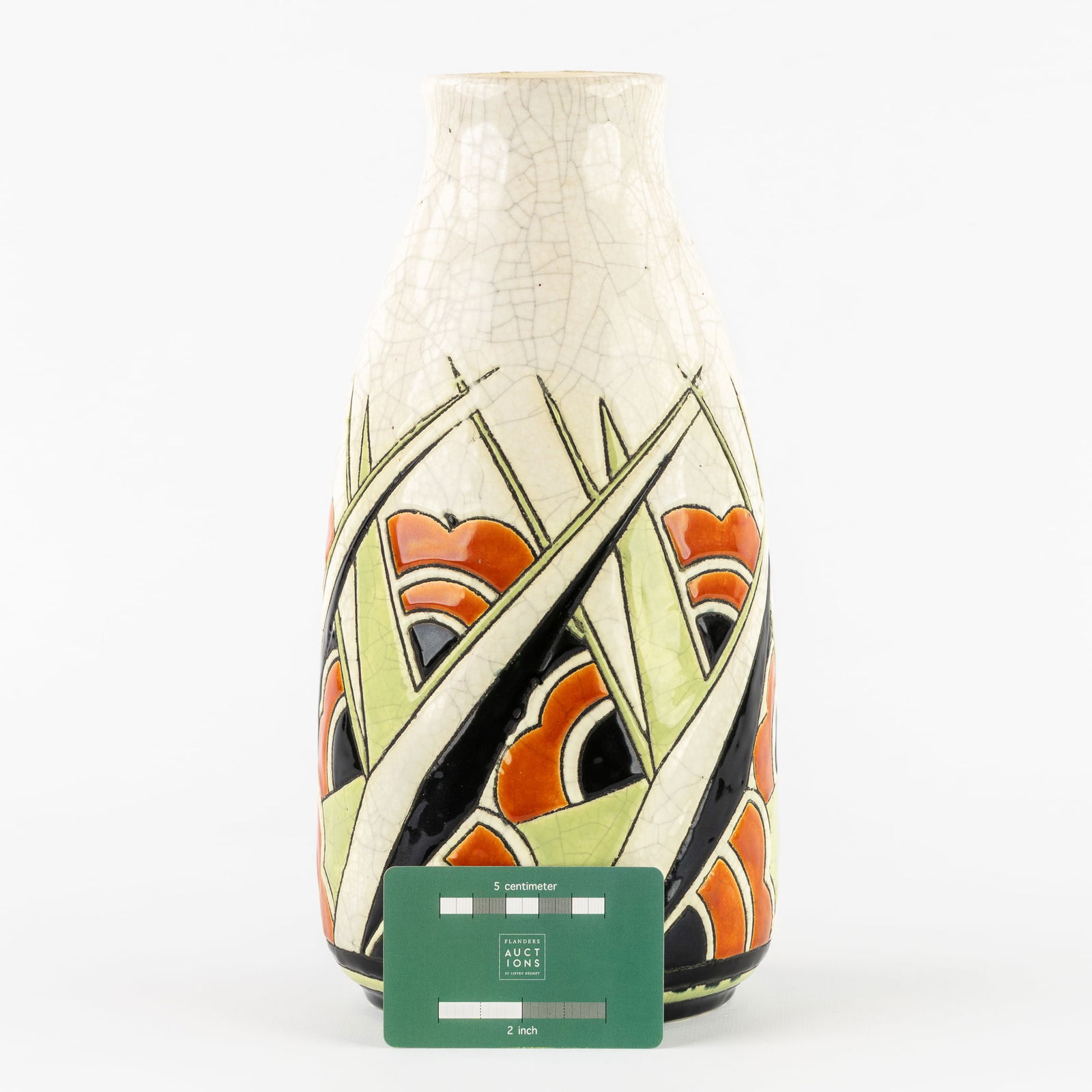Charles Catteau (1880-1966) 'Vase' for Boch Keramis.: Charles Catteau (1880-1966) 'Vase' for Boch Keramis. Polychrome design with floral motifs.Decor 1122. Model 896.Signed Boch Keramis. Dimensions:(H:29 x L:14 cm)