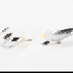 Two Silver Sauce Boats. Grann & Laglaye (Denmark) en Bruckmann & Söhne (Germany). Art Deco. Silver,: Two Silver Sauce Boats. Grann & Laglaye (Denmark) en Bruckmann & Söhne (Germany). Art Deco. Silver. Silver sauce boat, with wooden accent in the handle.Marked with city mark Copenhagen, Denmark,