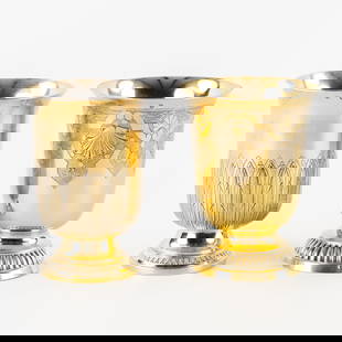 Two Vermeil Tulip Tumblers, France, 19th. C. Silver, 407g.: Two Vermeil Tulip Tumblers, France, 19th. C. Silver Gilded silver tulip-shaped drinking cups or tumblers. Decorated with engraved stylized lanceolate leaves. (H: 10 cm x D: 7 cm) (193g)Decorated with