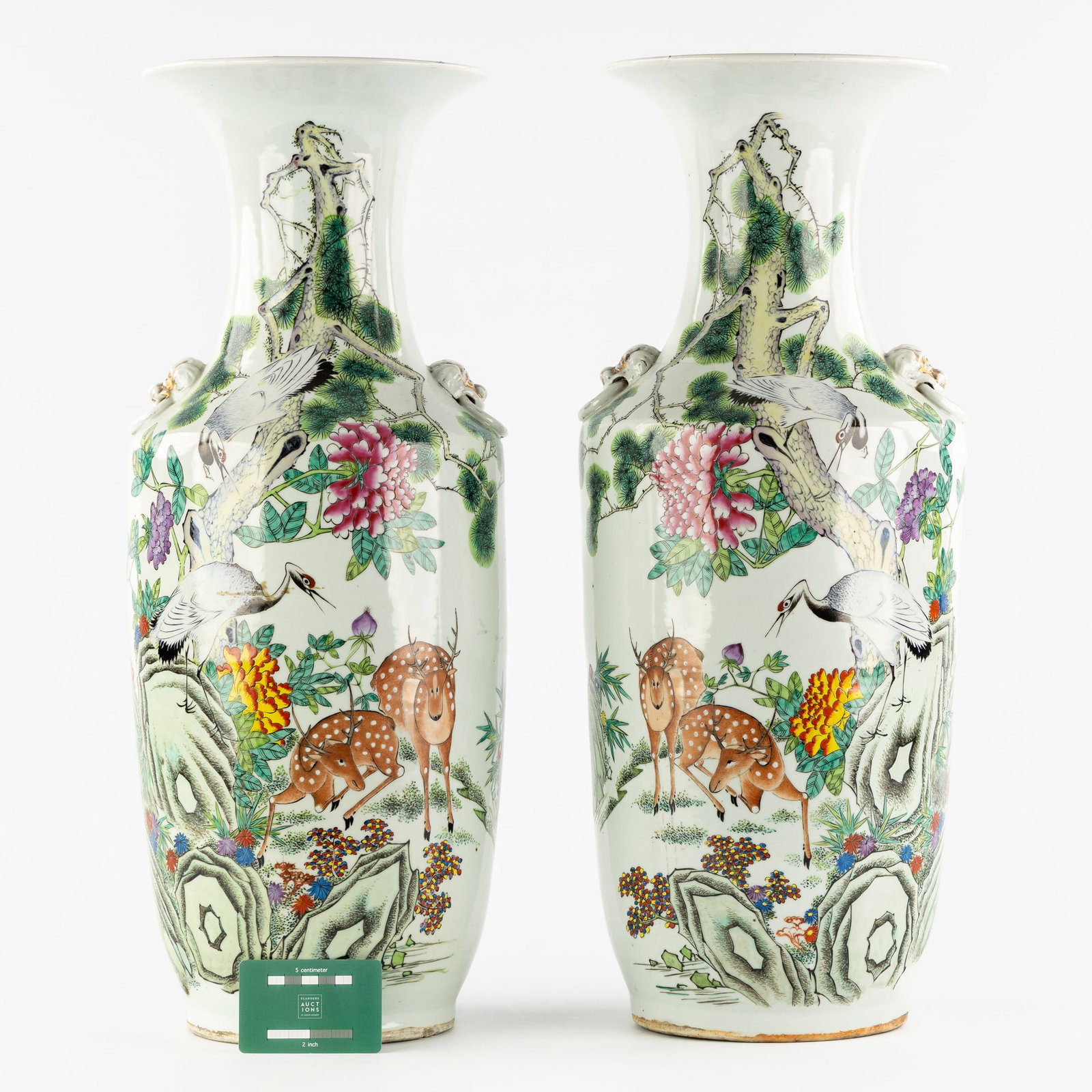 A Pair of Chinese Famille Rose Vases, decorated with Deer and Cranes in a Garden.: A Pair of Chinese Famille Rose Vases, decorated with Deer and Cranes in a Garden. Chinese porcelain, famille rose.Decorated with deer and cranes in a garden and calligraphy. Dimensions:(W:25 x H:5