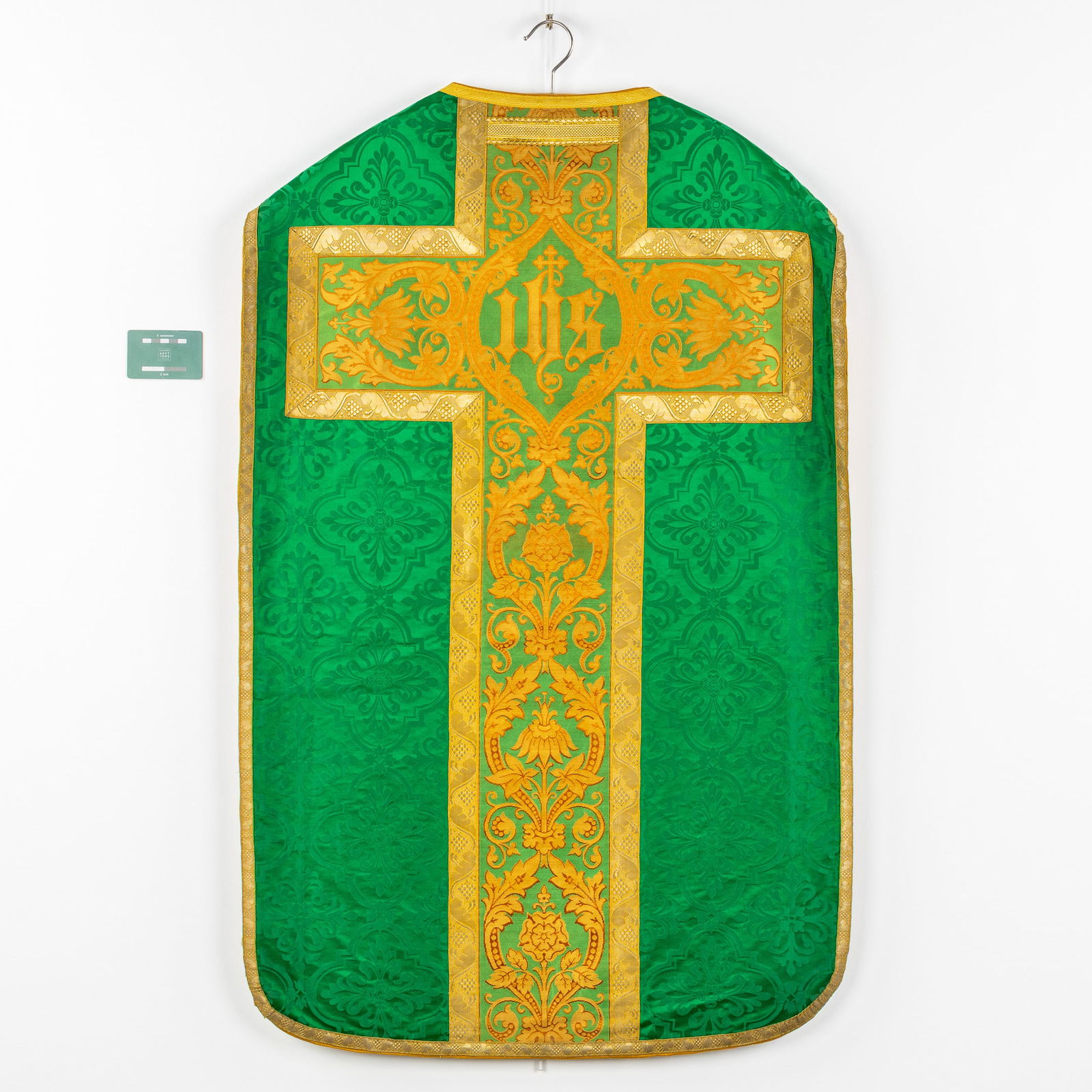 A set of liturgical vestments, Green fabric with embroideries, Roman Chasuble and Dalmatics.: A set of liturgical vestments, Green fabric with embroideries, Roman Chasuble and Dalmatics. Green fabric with richly decorated floral decor embroidery. Two Dalmatics, Roman Chasuble, Bursa and