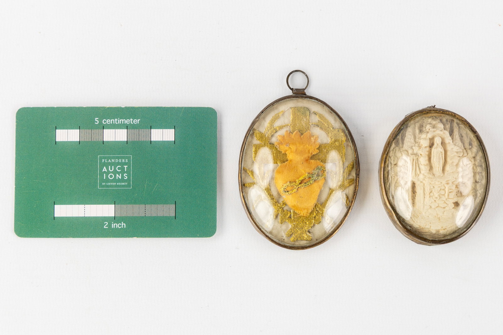 An 'Ex Voto' embroidery and 'Our Lady of Lourdes', Meerschaum. 20th C.: An 'Ex Voto' embroidery and 'Our Lady of Lourdes', Meerschaum. 20th C. Ex Voto or Sacred Heart. Our Lady of Lourdes. 20th century. Dimensions:(W:5 x H:6,6 cm)