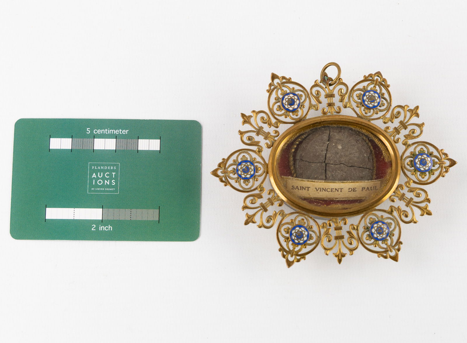 A sealed reliquary in an osculatorium finished with cloisonné enamel, Vincentius à Paulo. (1 of 3)