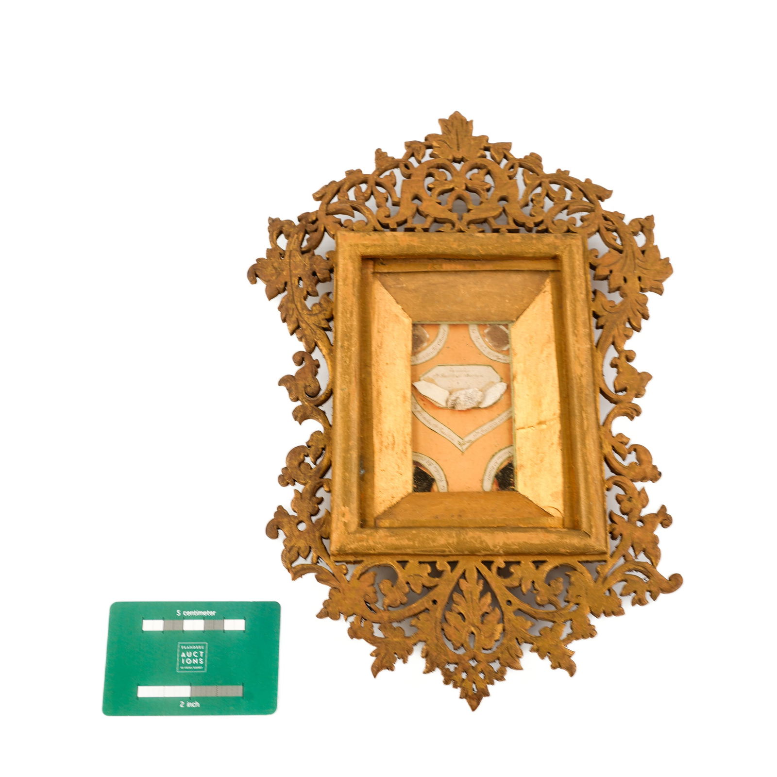 A wood sculptured reliquary shrine with relics for Saint Basilidus and Chanel. (1 of 3)