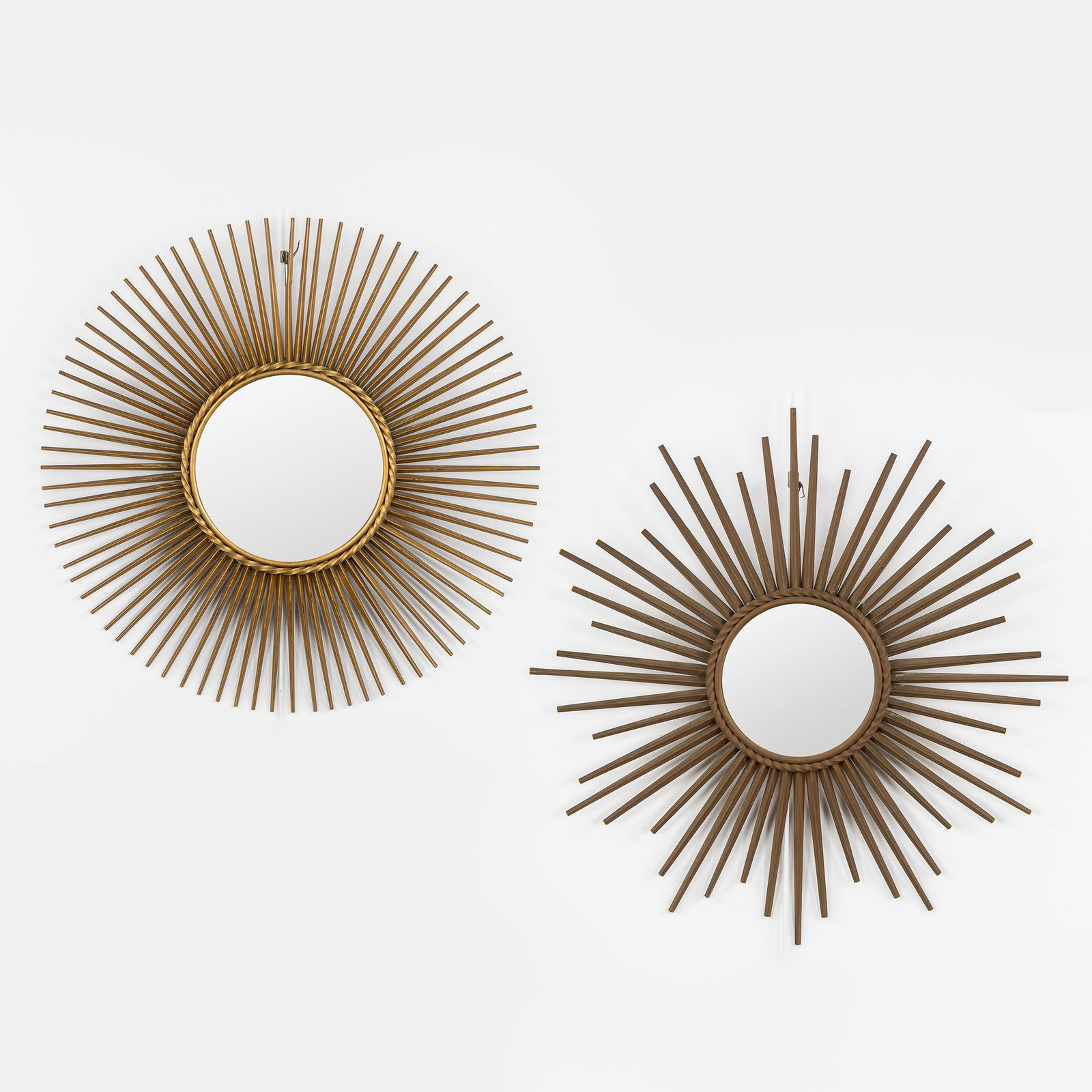 Chaty Vallauris, Two mid-century Sunburst Mirrors. Convex glass, gilt brass.