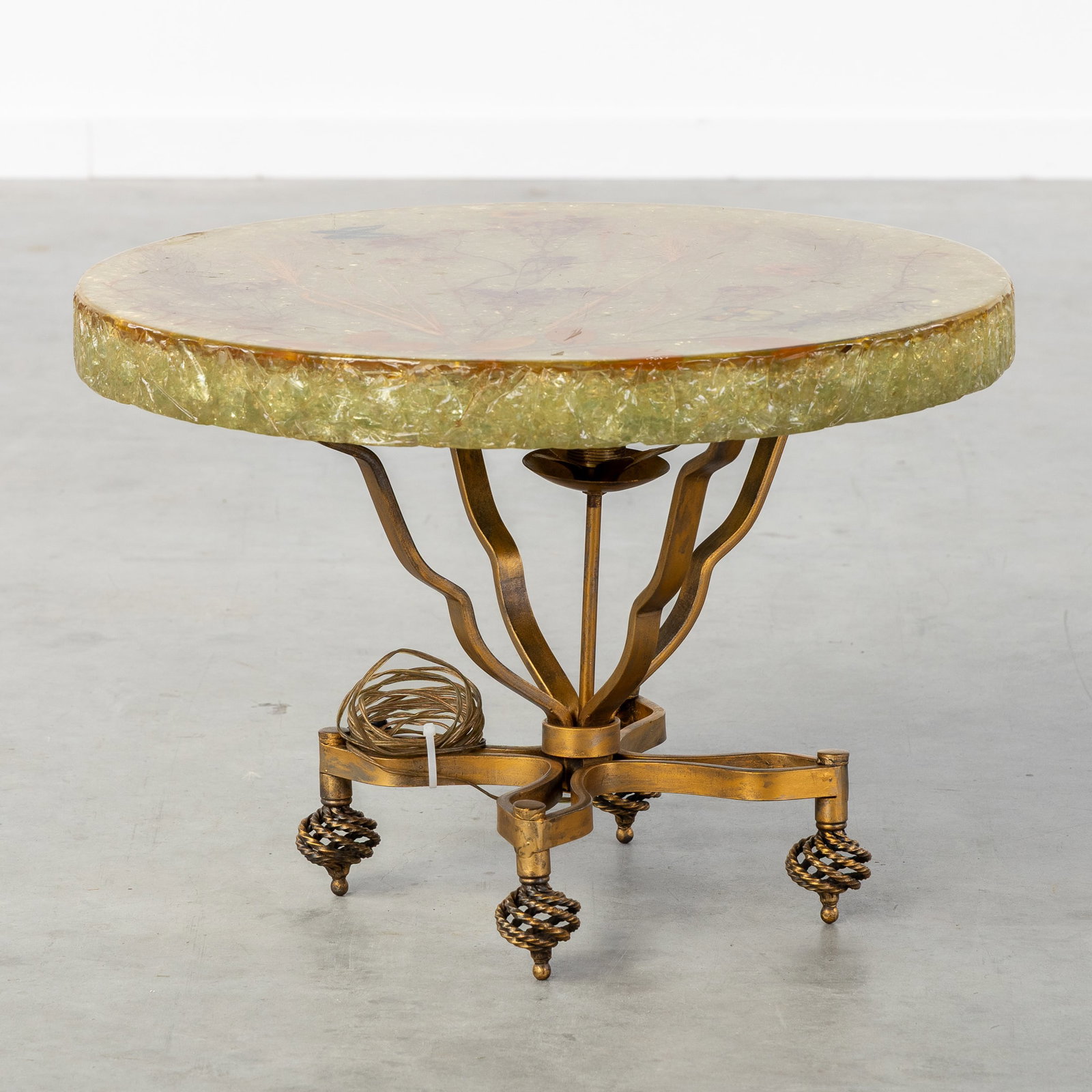 Accolay, A Side Table with Illuminated Resin Table Top, France, circa 1970.: Accolay, A Side Table with Illuminated Resin Table Top, France, circa 1970. Resin and patinated metal.Table top with decoration of dried flowers and butterflies.Wrought iron base/stand with light po