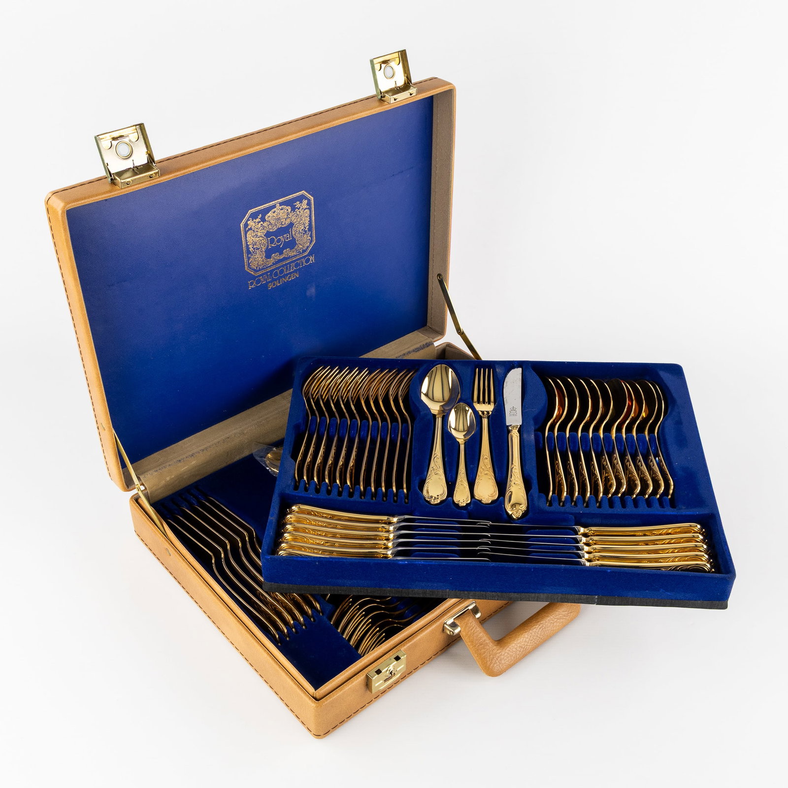 A gold-plated 'Royal Collection SBS Solingen' flatware cutlery set, 67 pieces, made in Germany. (1 of 9)