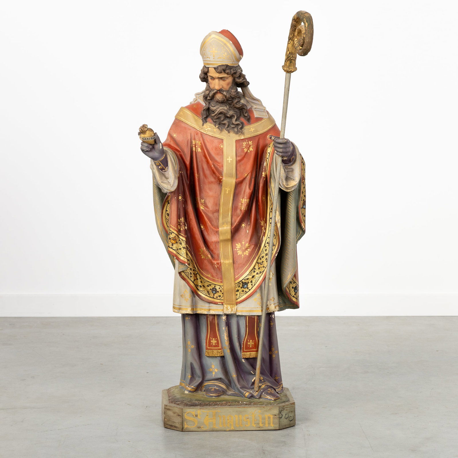 An antique sculpture of Saint Augustine, patinated plaster. (1 of 6)