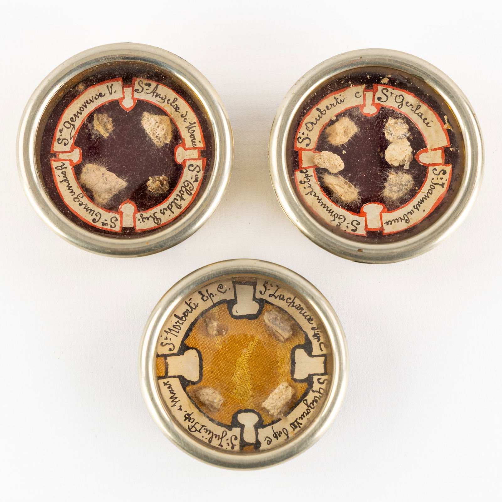 Three large and sealed multi-theca with relics for Popes, Martyrs and Saints. (1 of 2)