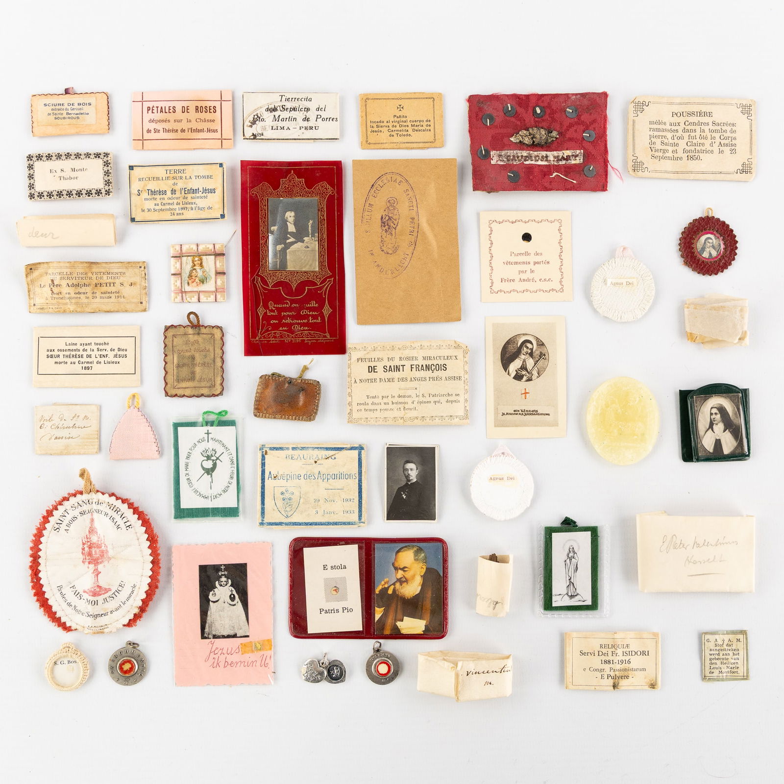 A Collection of 43 Relics,  the Blood of Christ, Saint Therese of Lisieux, Agnus Dei, and others. (1 of 6)
