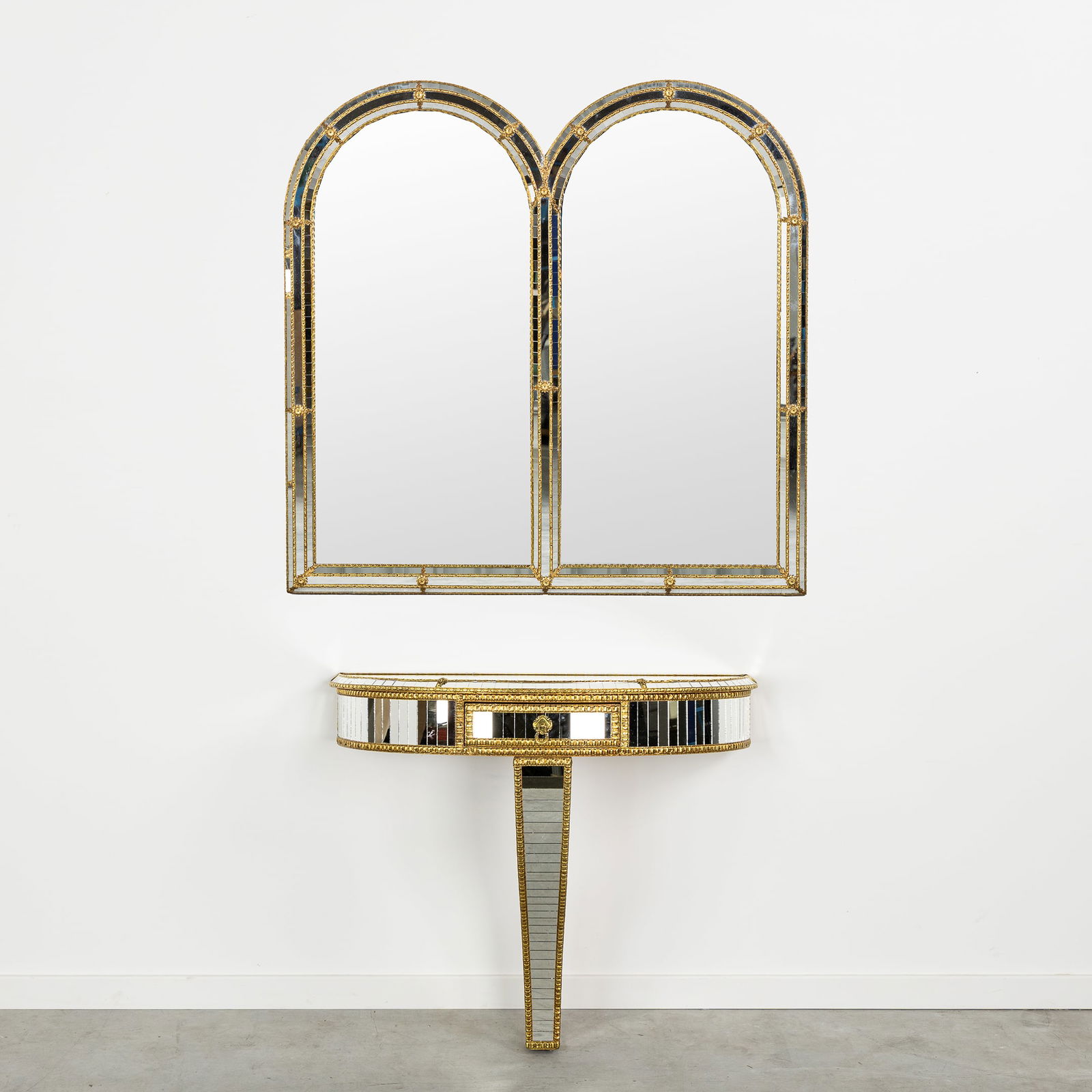 A Double Mirror with a Console Table, Brass and Mirror Glass, Spain, 20th C.: A Double Mirror with a Console Table, Brass and Mirror Glass, Spain, 20th century. Brass inlaid with mirror glass.Double mirror (H: 111 cm x W: 112 cm)Console table with drawer (H: 75 cm x W: 85 cm