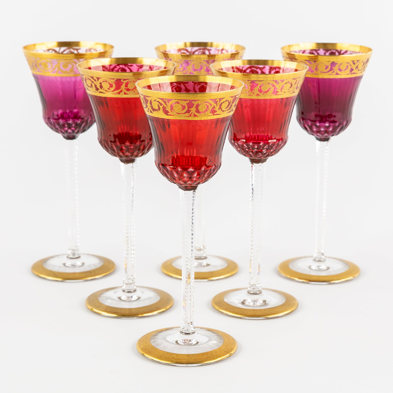 Saint Louis, 'Thistle Gold', A Set of Roemers or Rhine Wine Glasses, Coloured Crystal, Engraved: Saint Louis, 'Thistle Gold', A Set of Roemers or Rhine Wine Glasses, Coloured Crystal, Engraved Decorations and Etched Gold Decoration. Six glasses, red-coloured, cut, and etched crystal.'Thistle Gold