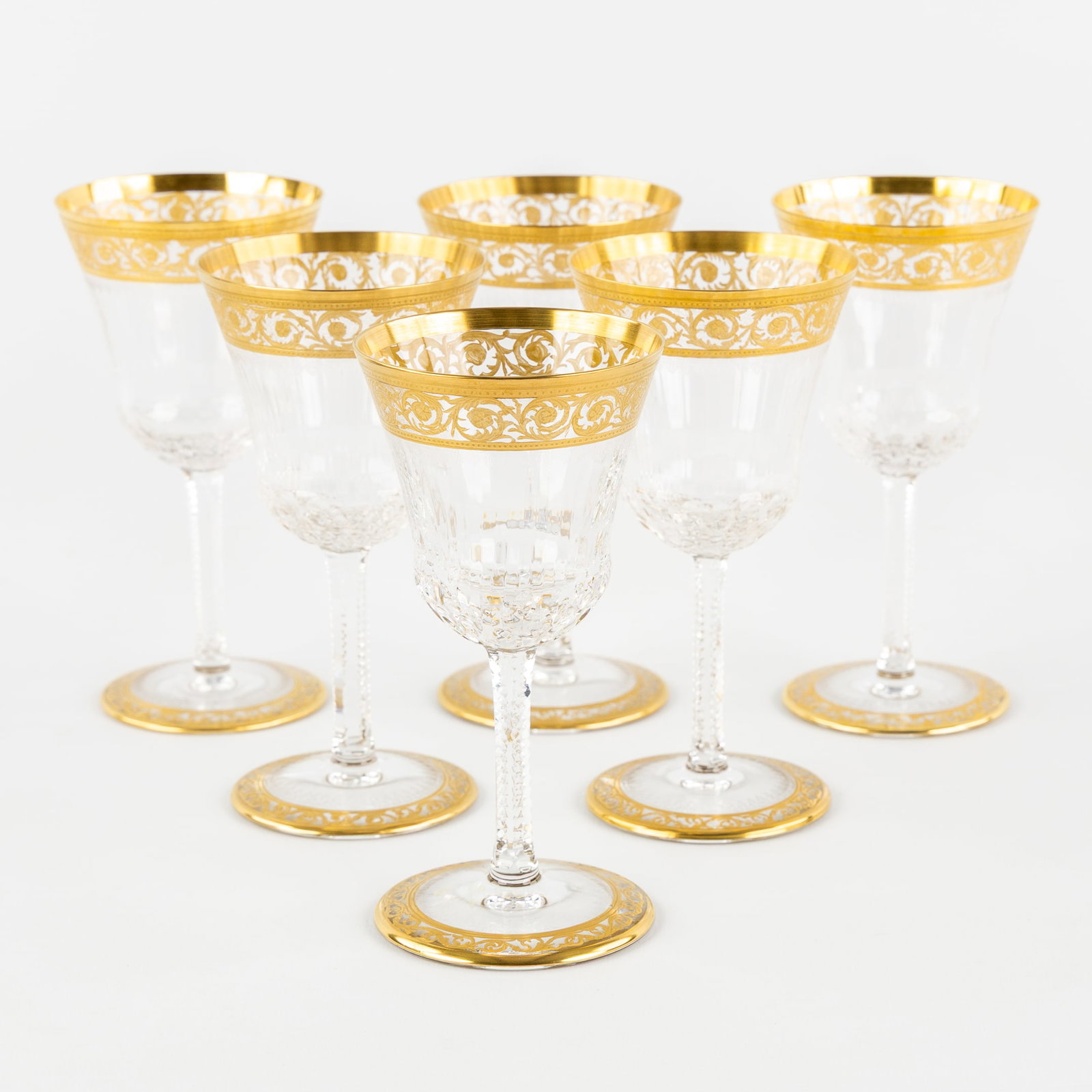 Saint Louis, 'Thistle Gold', A Set of 6 Red Wine Glasses, Engraved Decorations and Etched Gold: Saint Louis, 'Thistle Gold', A Set of 6 Red Wine Glasses, Engraved Decorations and Etched Gold Decoration. Six glasses, cut and etched crystal.'Thistle Gold' decoration.Of which five glasses are mar