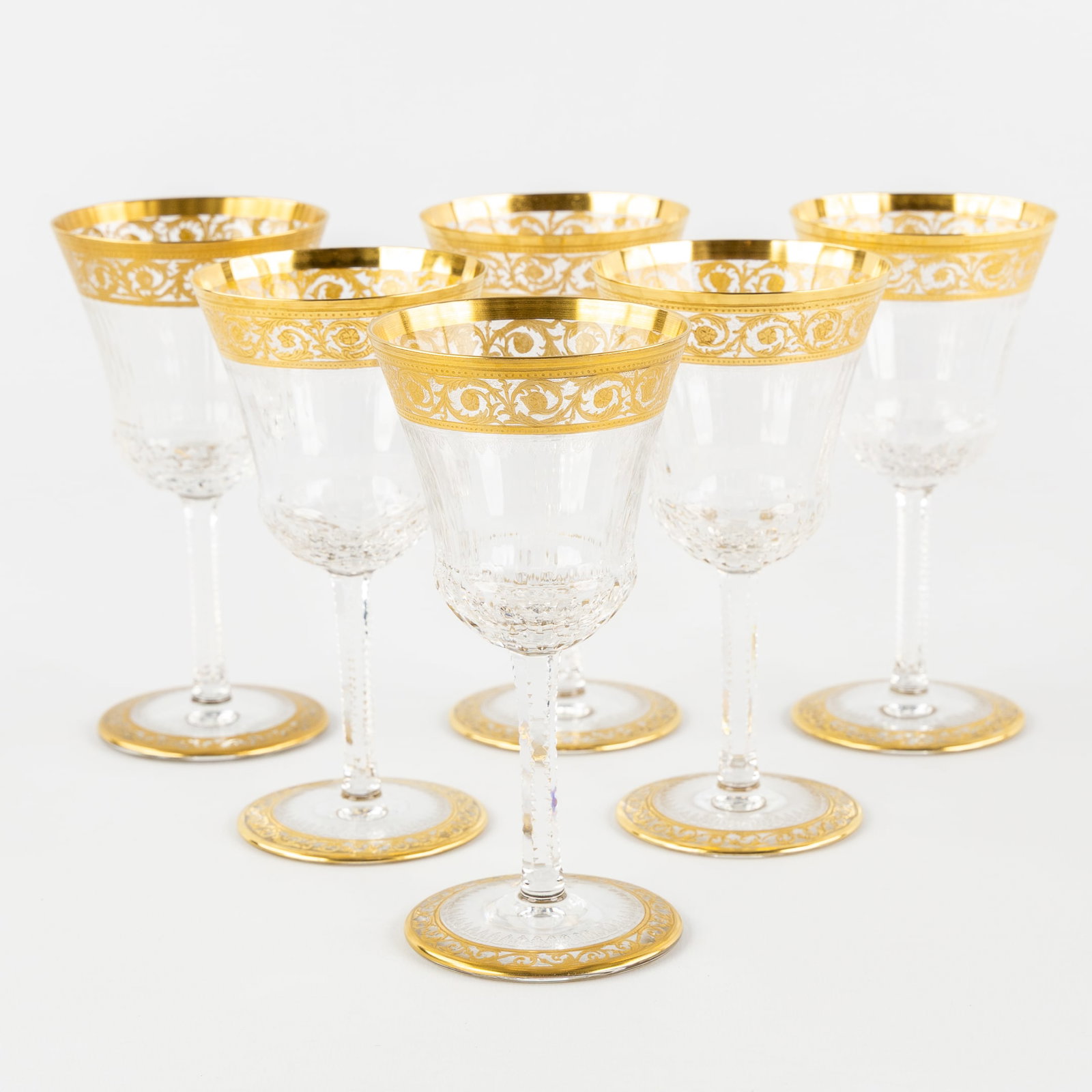 Saint Louis, 'Thistle Gold', A Set of 6 Red Wine Glasses, Engraved Decorations and Etched Gold: Saint Louis, 'Thistle Gold', A Set of 6 Red Wine Glasses, Engraved Decorations and Etched Gold Decoration. Six glasses, cut and etched crystal.'Thistle Gold' decoration.Of which five glasses are mar