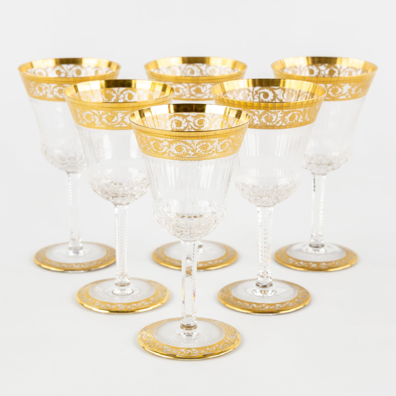 Saint Louis, 'Thistle Gold', A Set of 6 Red Wine Glasses, Engraved Decorations and Etched Gold: Saint Louis, 'Thistle Gold', A Set of 6 Red Wine Glasses, Engraved Decorations and Etched Gold Decoration. Six glasses, cut and etched crystal.'Thistle Gold' decoration.Of which 2 glasses are marked
