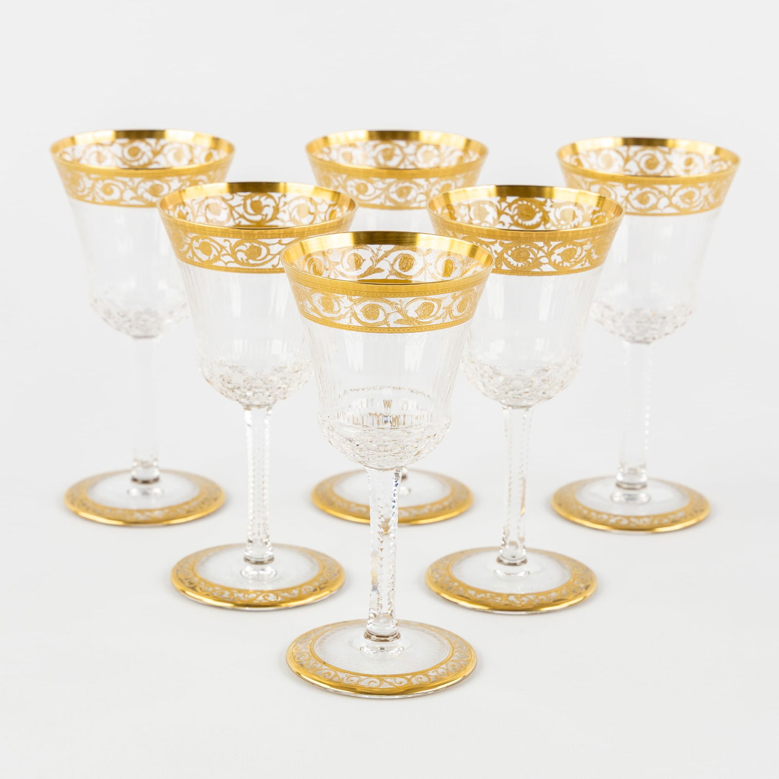 Saint Louis, 'Thistle Gold', A Set of 6 White Wine Glasses, Engraved Decorations and Etched Gold: Saint Louis, 'Thistle Gold', A Set of 6 White Wine Glasses, Engraved Decorations and Etched Gold Decoration. Six glasses, cut and etched crystal.'Thistle Gold' decoration.All glasses marked 'Saint-L