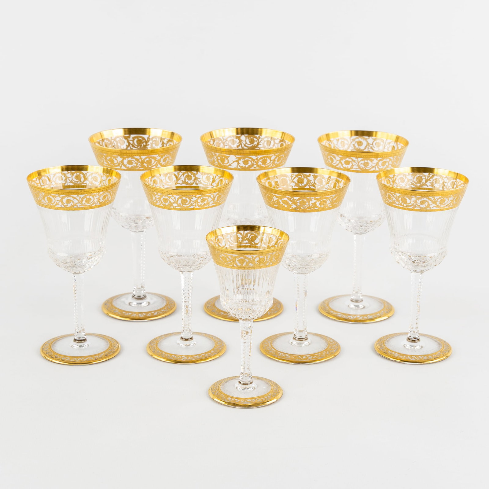 Saint Louis, 'Thistle Gold', A Set of 4 White Wine Glasses, 3 Red Wine Glasses, and 1 Port Glass,: Saint Louis, 'Thistle Gold', A Set of 4 White Wine Glasses, 3 Red Wine Glasses, and 1 Port Glass, Engraved Decorations and Etched Gold Decoration. Eight glasses, cut and etched crystal.'Thistle Gold' 