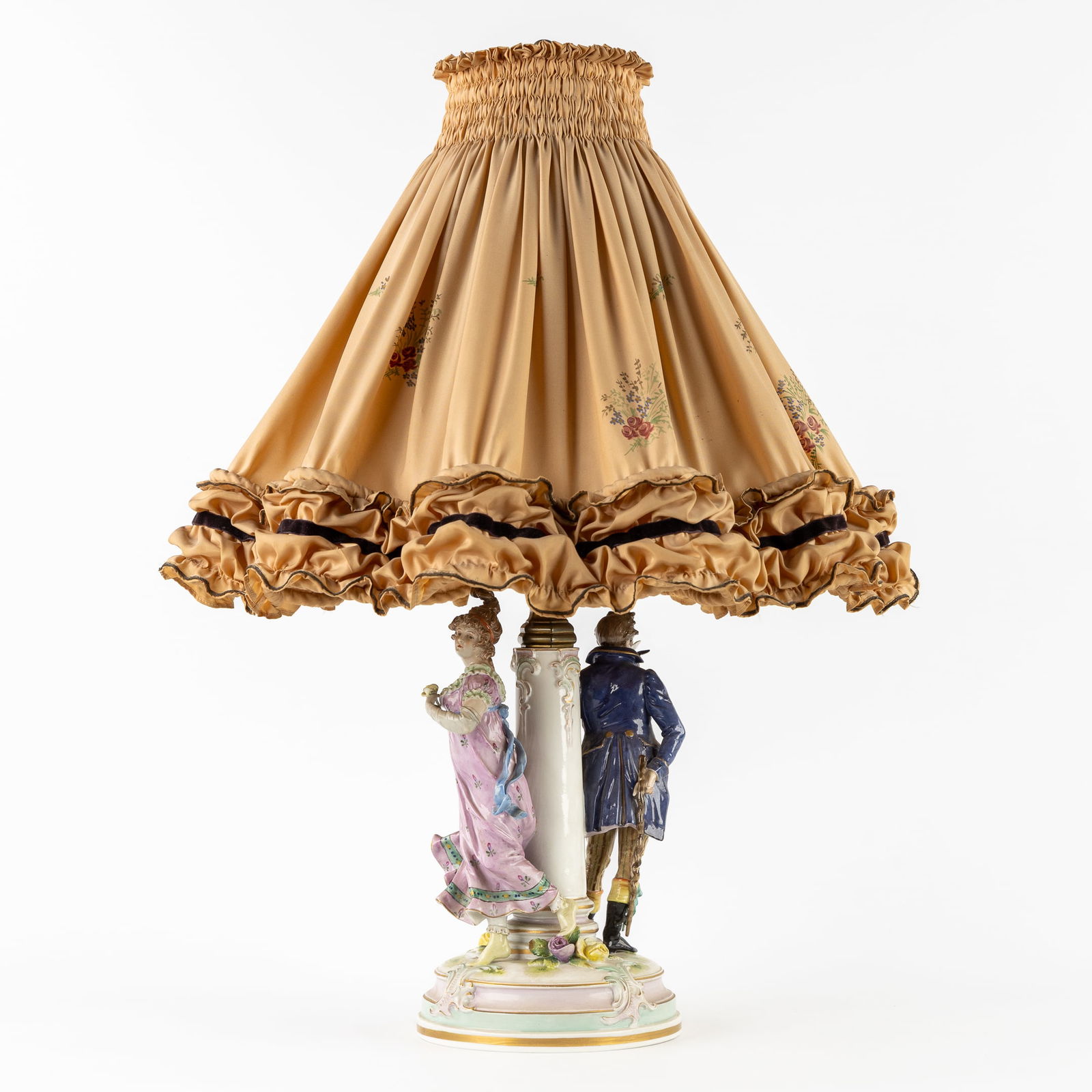 Volkstedt-Rudolstadt, A Table Lamp with a Nobleman and a Lady, Polychrome Porcelain, Thuringia, 20th: Volkstedt-Rudolstadt, A Table Lamp with a Nobleman and a Lady, Polychrome Porcelain, Thuringia, 20th century. Polychrome porcelain and brass/bronze.A table lamp with two figures, a nobleman and a lady