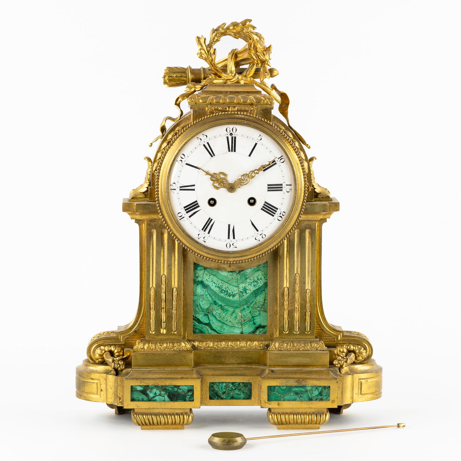 An Impressive Mantel Clock, Gilded Bronze with Malachite, Louis XVI style, France, Second half of: An Impressive Mantel Clock, Gilded Bronze with Malachite, Louis XVI style, France, Second half of the 19th century. Gilded bronze with malachite plaques.Work marked 'RAINGO FRERES - PARIS'Louis XVI