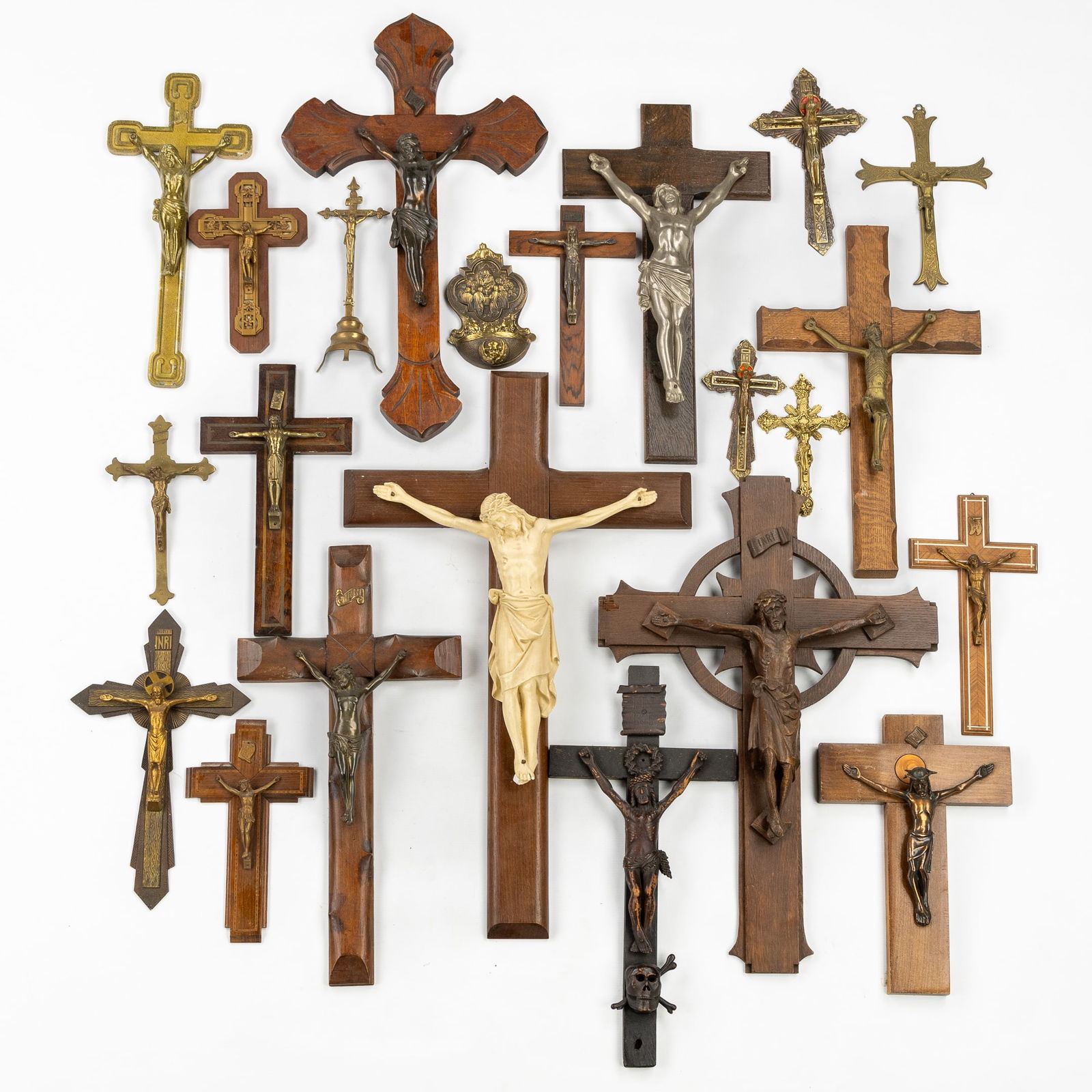 A Large Collection of 21 Crucifixes with Corpus Christi and a Holy Water Font. Bronze, Metal, Wood (1 of 5)