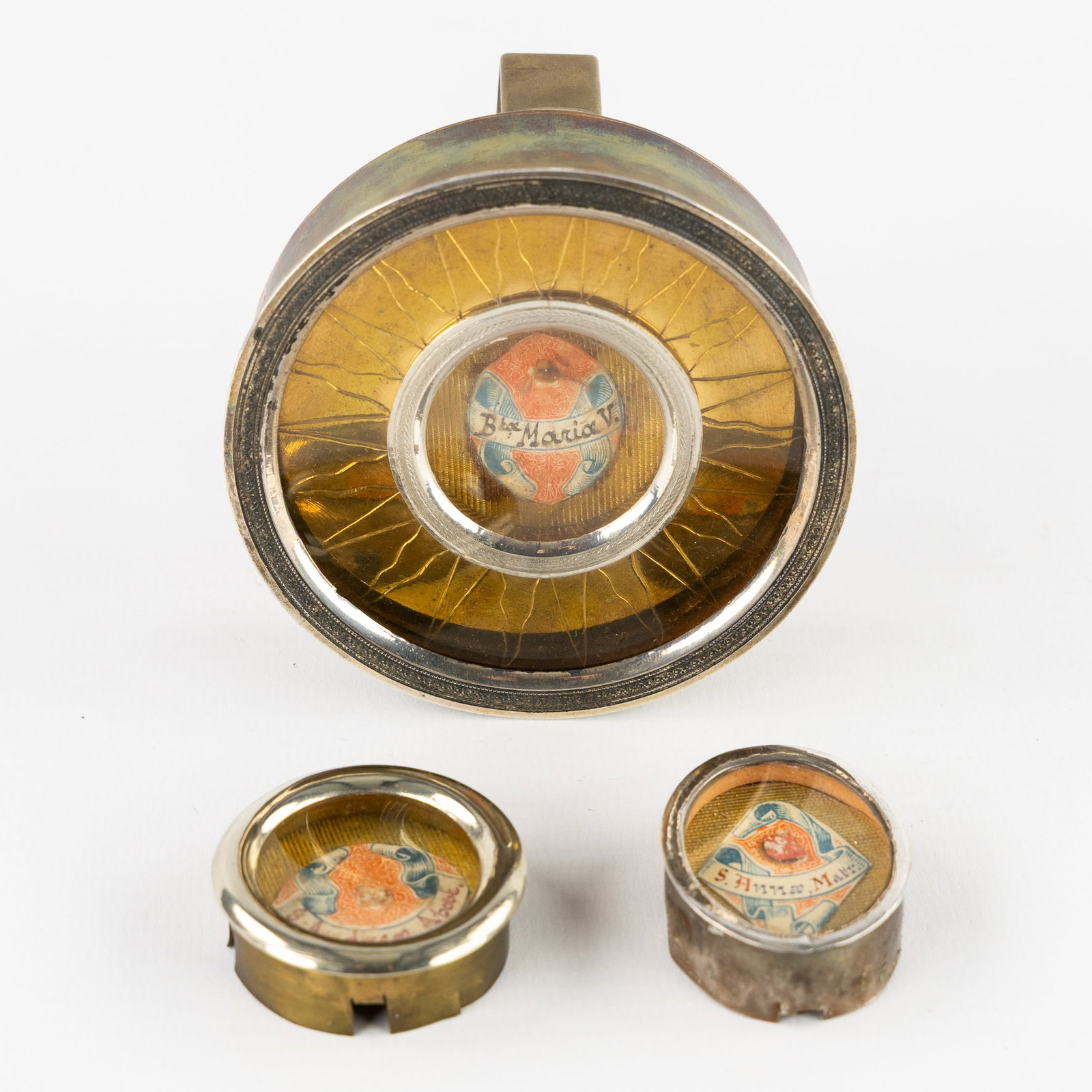 Three Sealed Theca, one of which mounted in an Osculatorium, with Relics for the Virgin Mary, Saint: Three Sealed Theca, one of which mounted in an Osculatorium, with Relics for the Virgin Mary, Saint Anne and Apostle Andrew. 1. Osculatorium with sealed relic for the Blessed Virgin Mary (Btae Mariae 
