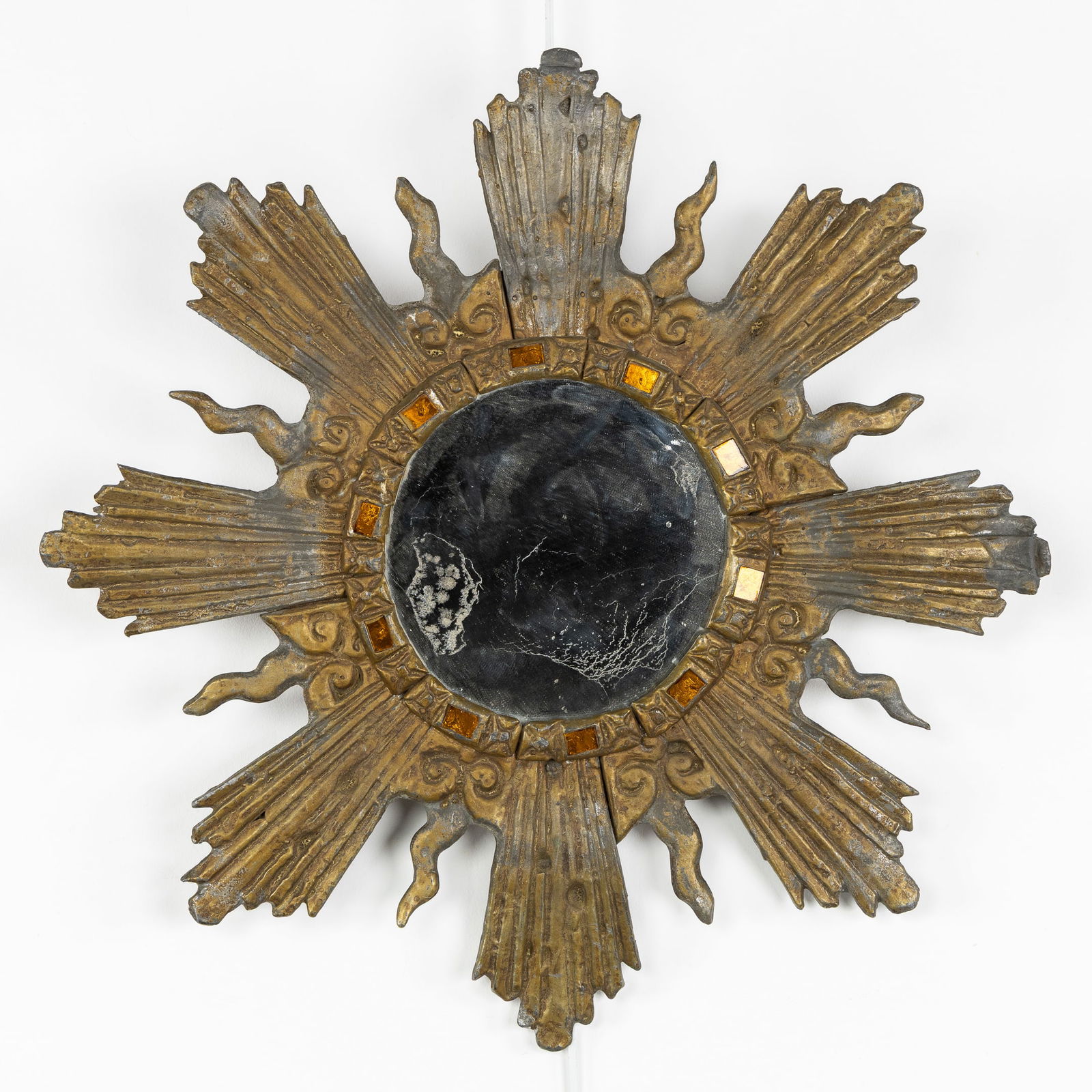 Irena Jaworska (1925-2021) A Sunburst Mirror, Gilded Lead and Coloured Glass, Circa 1960.: Irena Jaworska (1925-2021) A Sunburst Mirror, Gilded Lead and Coloured Glass, Circa 1960. Gilded lead, decorated with orange-coloured glass plaques.Designed by Irena Jaworska (1925-2021), a student of