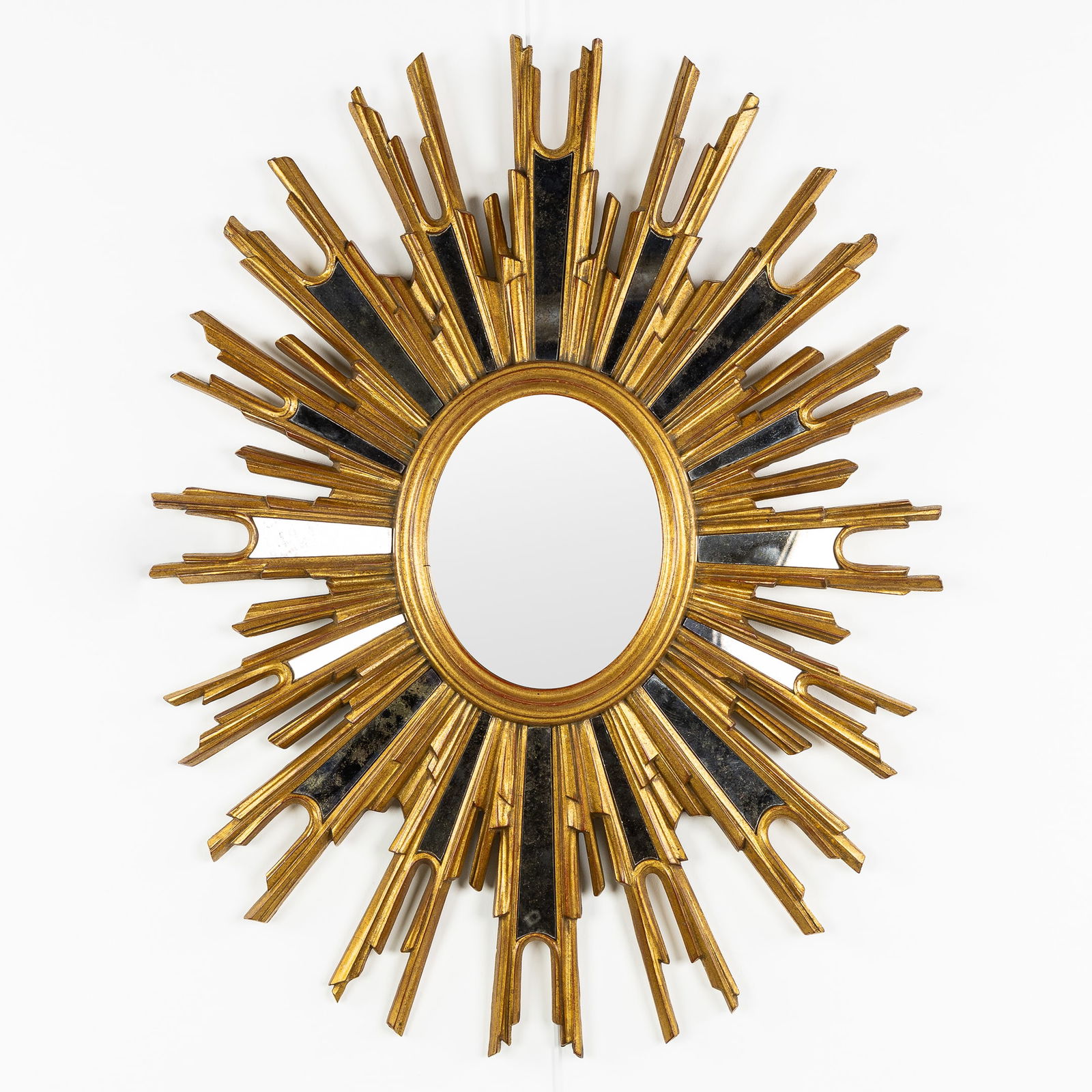 Deknudt, An Oval Mid-Century Sunburst Mirror, Gilded, Flat Glass. Circa 1970. (1 of 4)