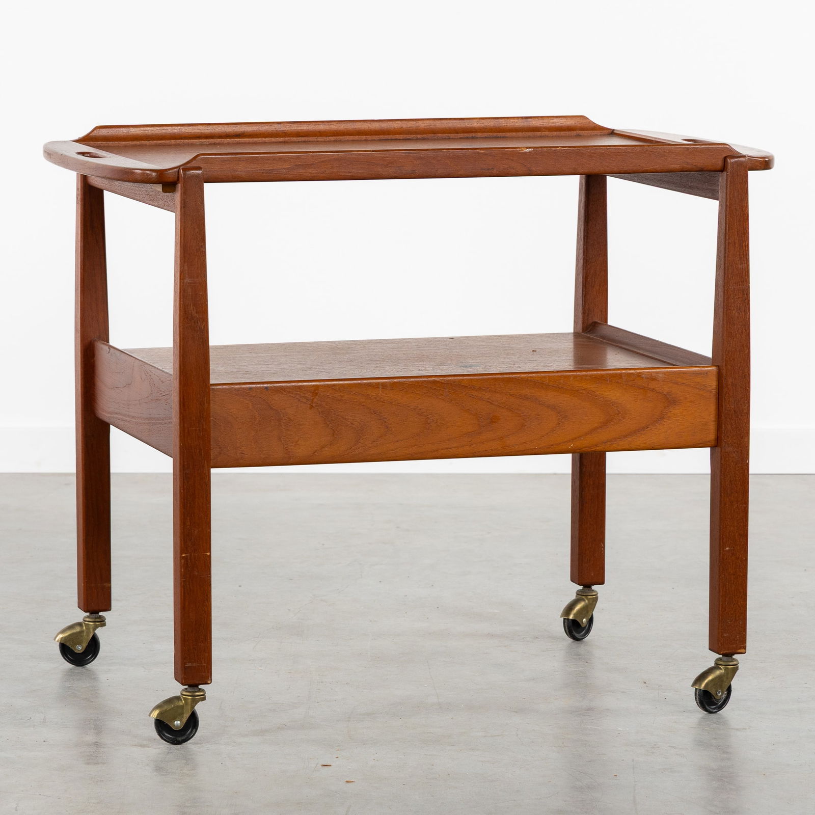 Sven Engström & Gunnar Myrstrand (XX) 'Julius', a Teak Serving Trolley, for Tingströms, Sweden,: Sven Engström & Gunnar Myrstrand (XX) 'Julius', a Teak Serving Trolley, for Tingströms, Sweden, circa 1960. Teak.Serving trolley or bar cart, with a removable serving tray and drawer under the botto