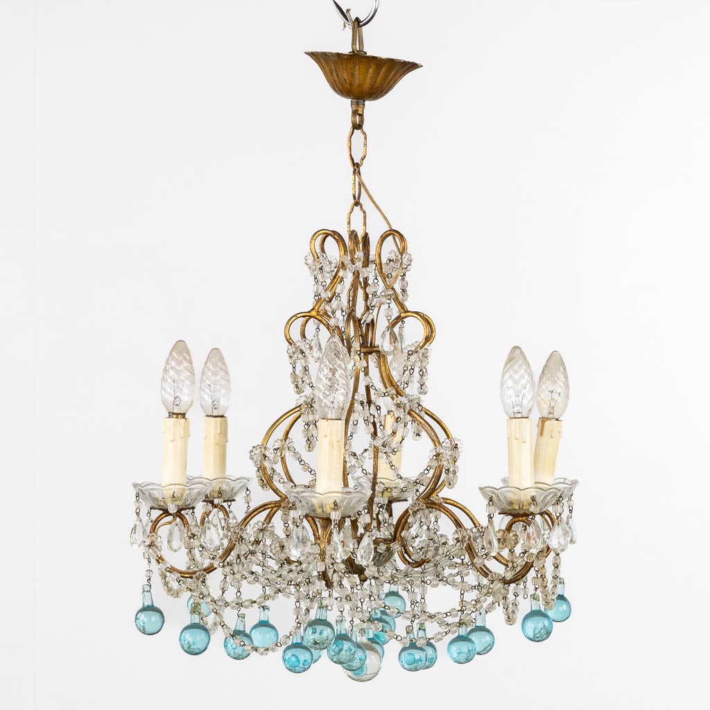 An Attractive Chandelier with 'light blue' glass.: An Attractive Chandelier with 'light blue' glass. 6 illumination points.