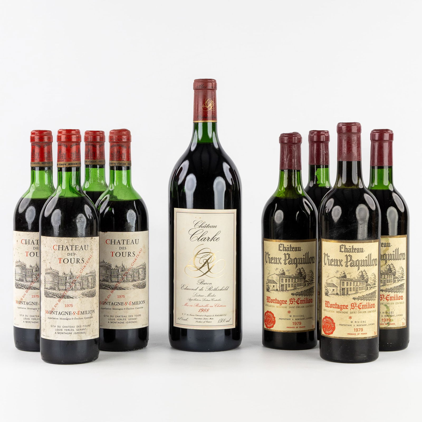 9 bottles of fine wine, Château Des Tours, Château Vieux Paquillon, Chateau Clarcke Magnum.: 9 bottles of fine wine, Château Des Tours, Château Vieux Paquillon, Château Clarcke Magnum. Château Des Tours 1975 - 4 bottles, 75 cl. Château Vieux Paquillon 1979 - 4 bottles, 75 cl. Château Cl