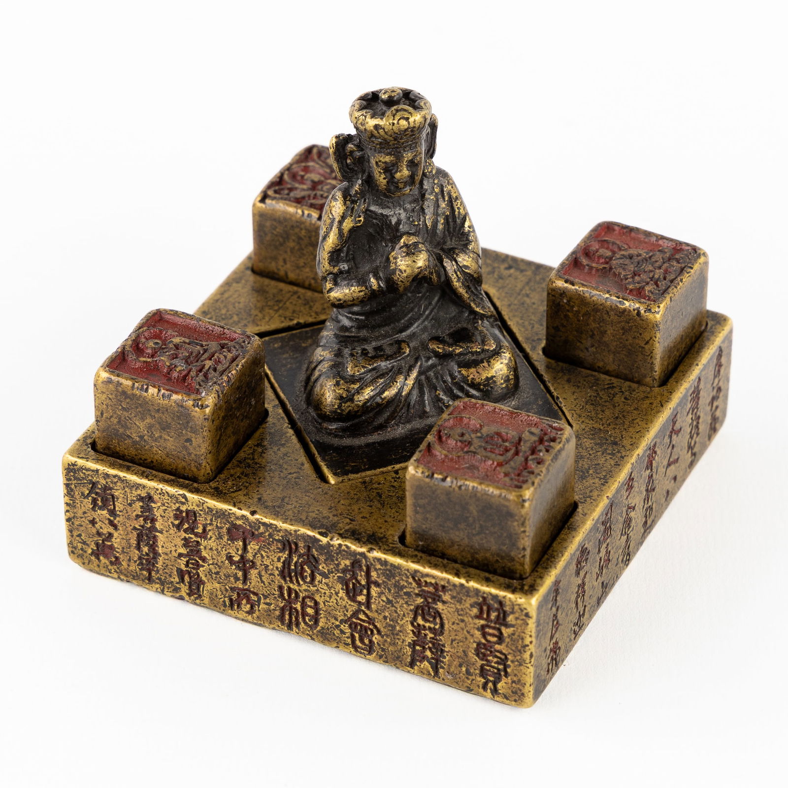 A Chinese Bronze Stamp Holder with a Seal Stamp or Yinzhang and Four Smaller Stamps depicting Buddha (1 of 7)