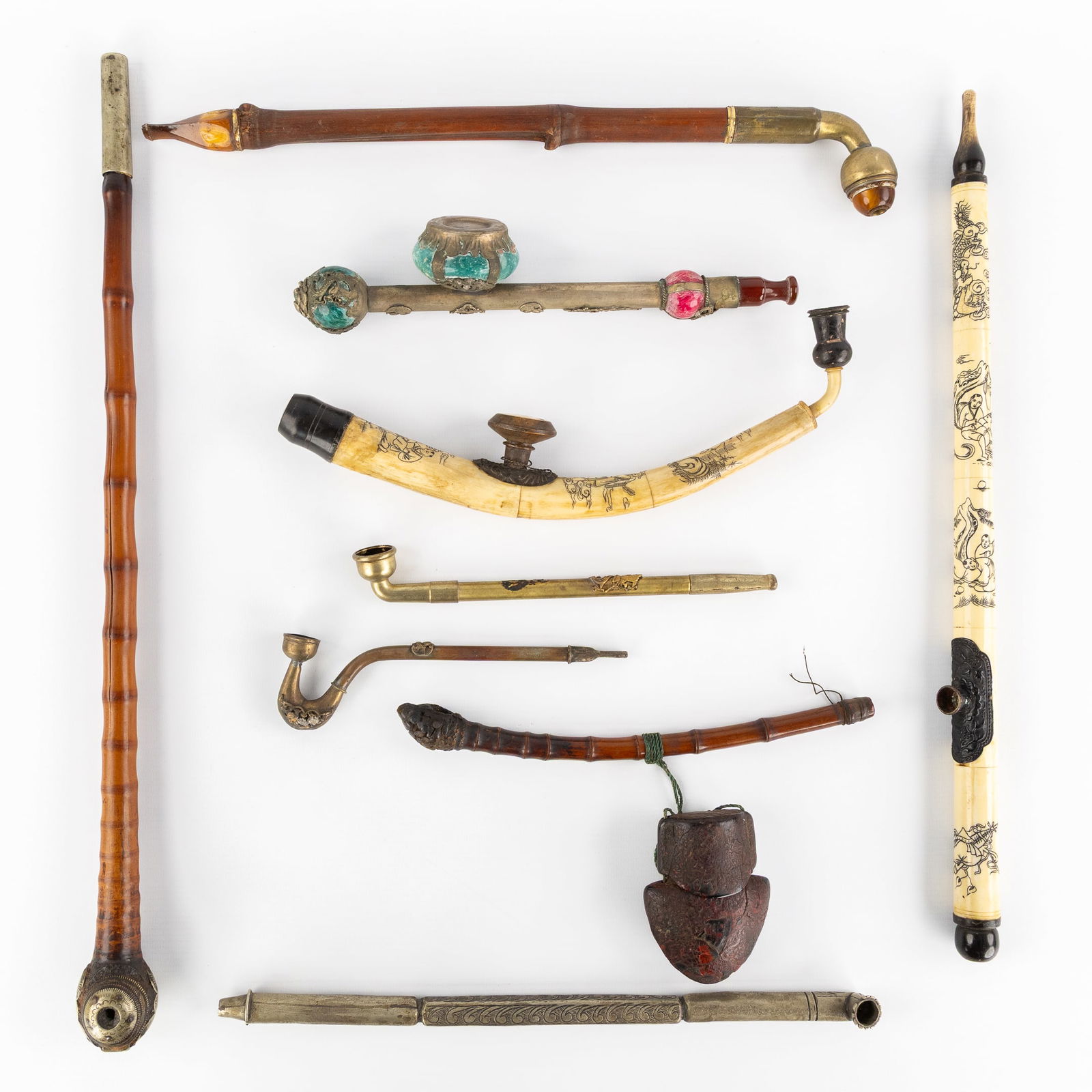 A Collection of Nine Hmong Opium Pipes, Bamboo, Metal, and Bone. Northern Laos, China, and Myanmar. (1 of 8)