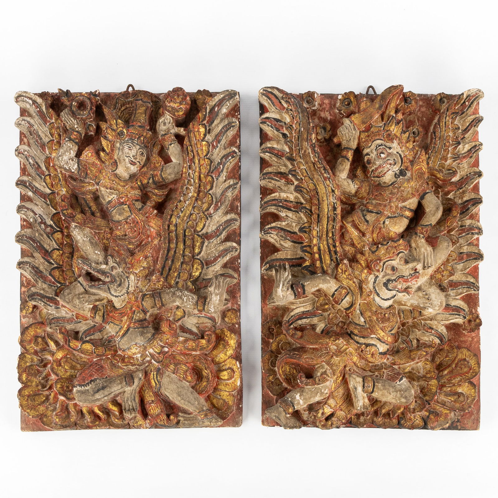 A Pair of Decorative Balinese High-relief Panels, sculptured and gilded wood, circa 1900. (1 of 8)