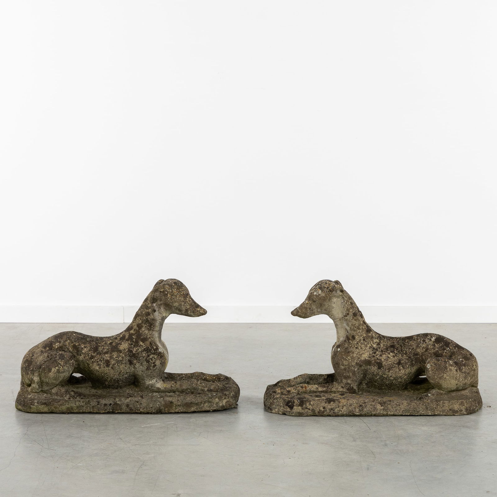 A Pair of Decorative Garden Statues of Reclining Greyhounds, Concrete, 20th C. (1 of 6)