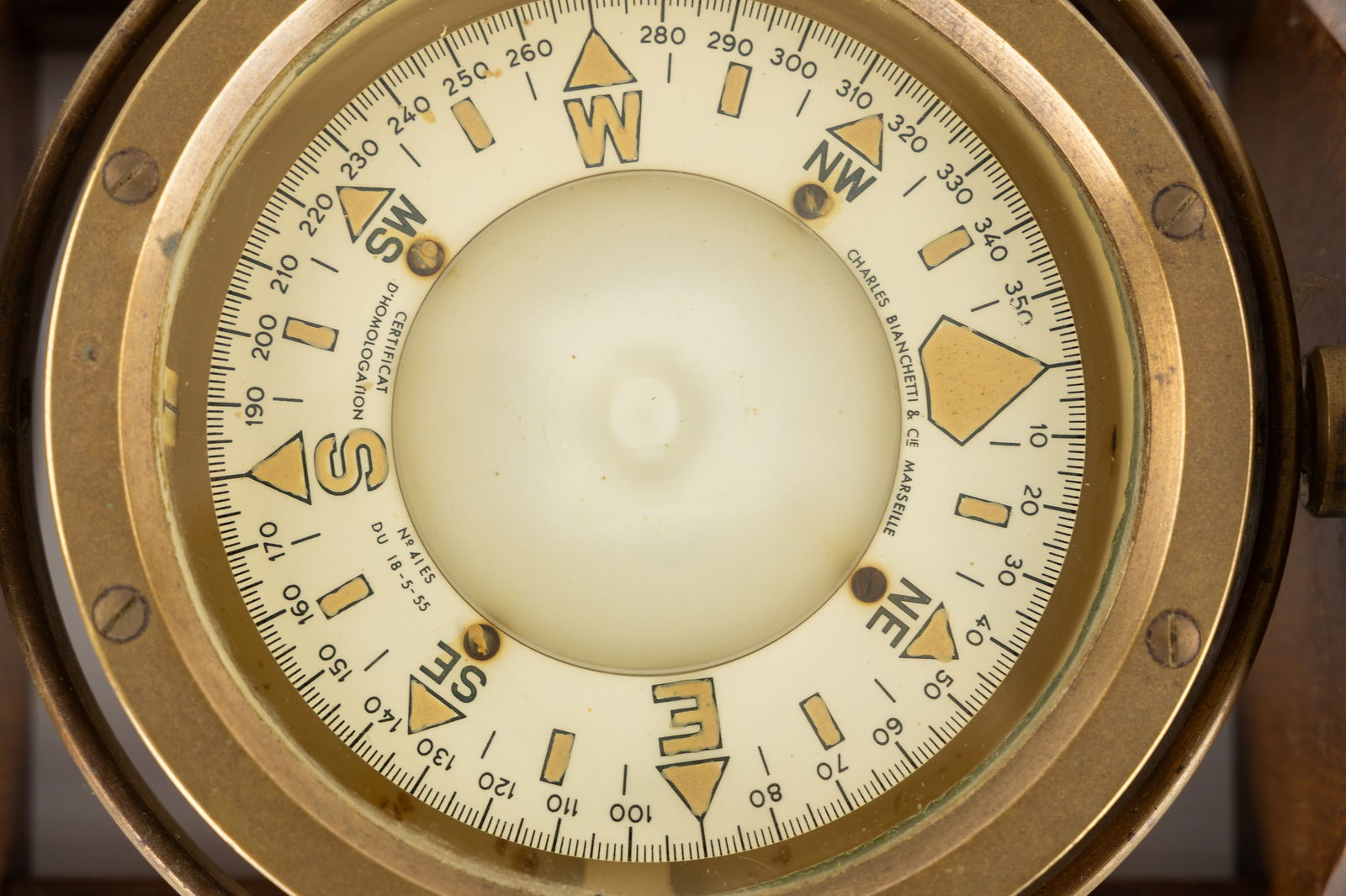 A Brass Ship's Compass, Charles Bianchetti & Cie, Marseille, mounted in a wooden table bracket. - 4