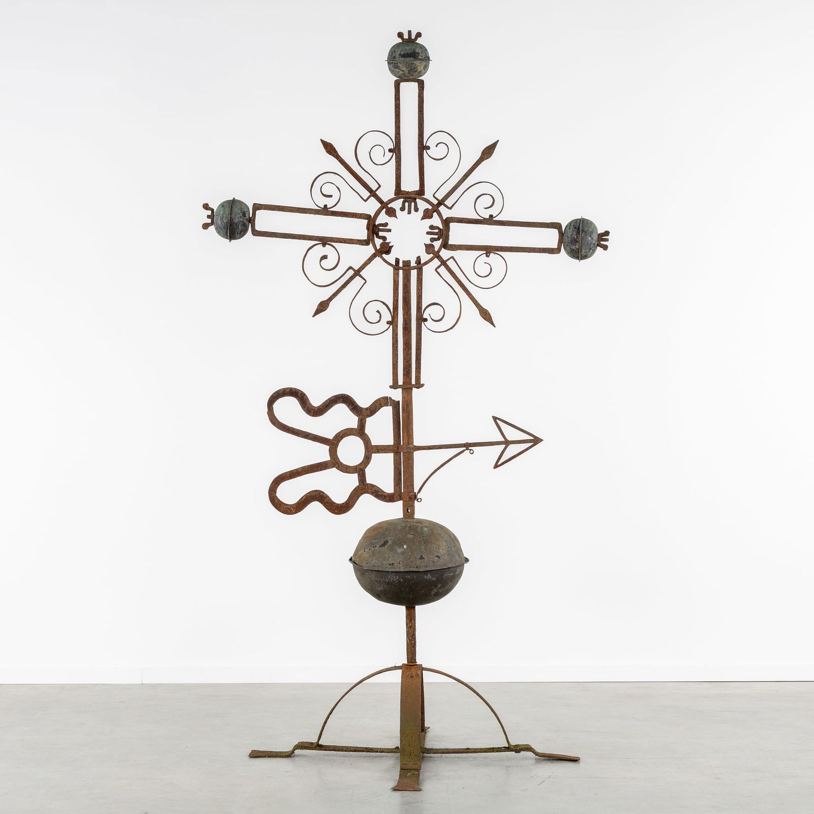 A Large Wrought Iron Tower Cross with a Weather Vane and Copper Spheres.: A Large Wrought Iron Tower Cross with a Weather Vane and Copper Spheres. Wrought iron and copper.Tower cross finished with copper spheres.With a weather vane underneath the cross.