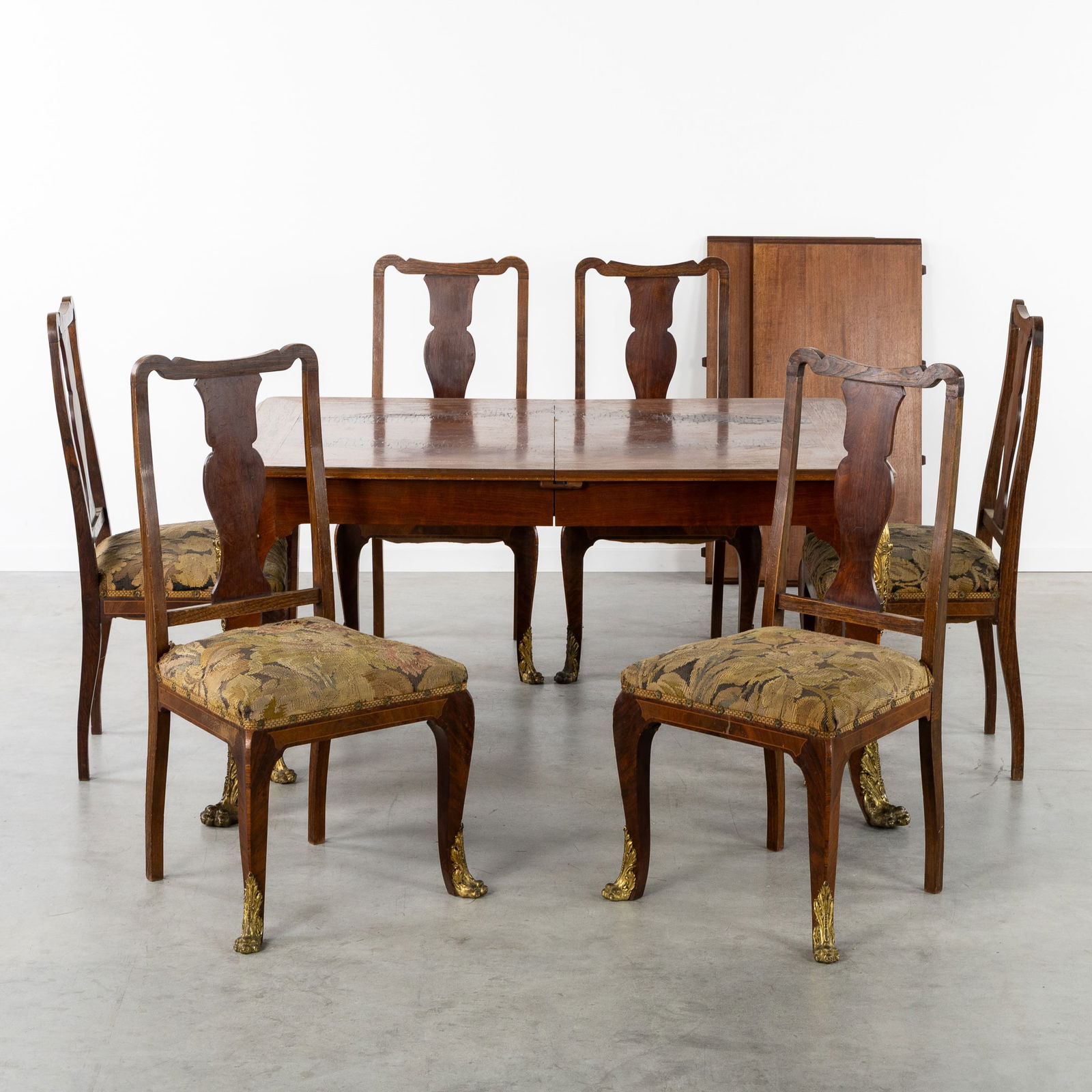 A Dining Table and Six Chairs, Richly decorated with Gilded Bronze, Regence style, circa 1900. (1 of 12)