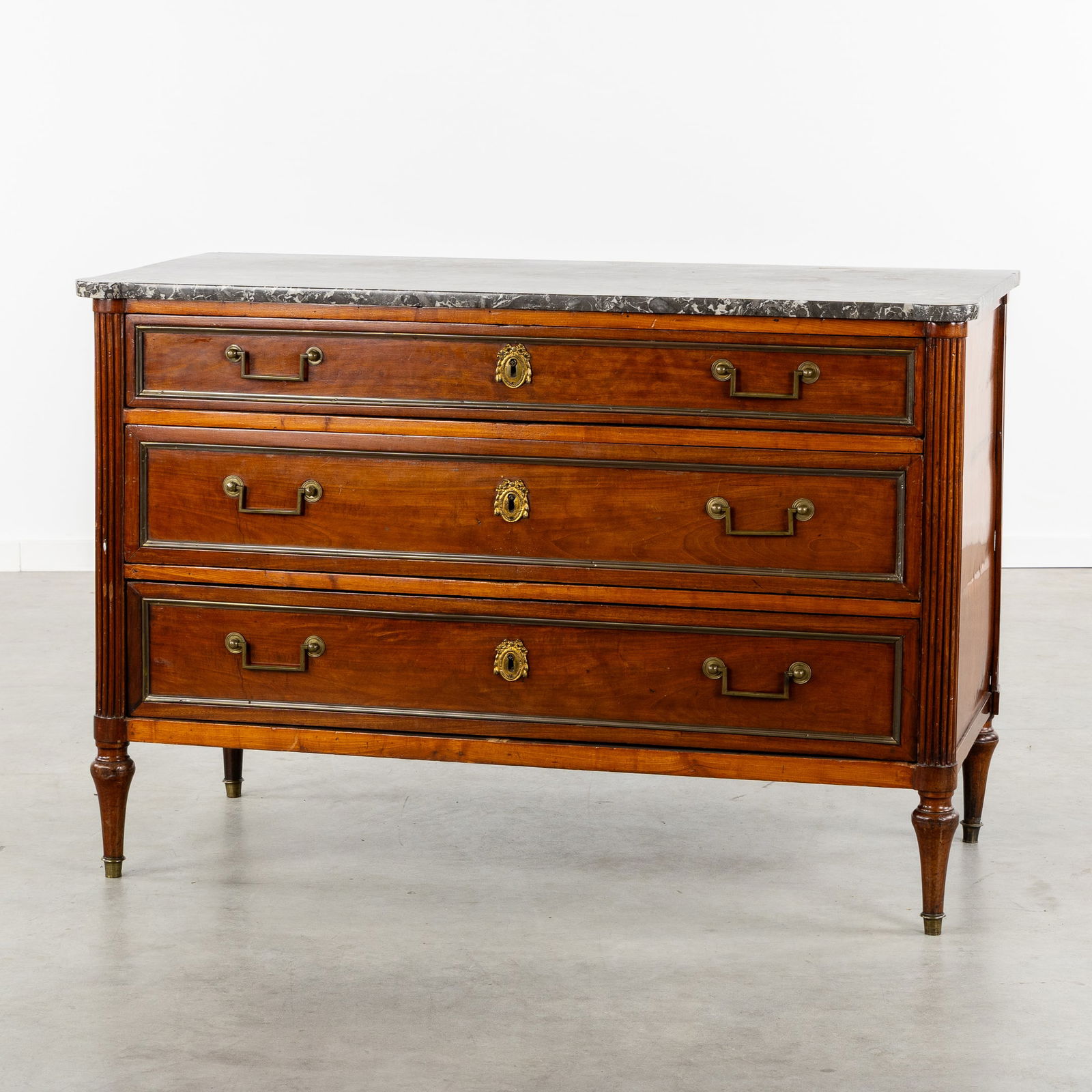 An Antique Mahogany Chest of Drawers, mounted with Bronze Fittings and a Marble Top, Louis XVI, Late (1 of 10)