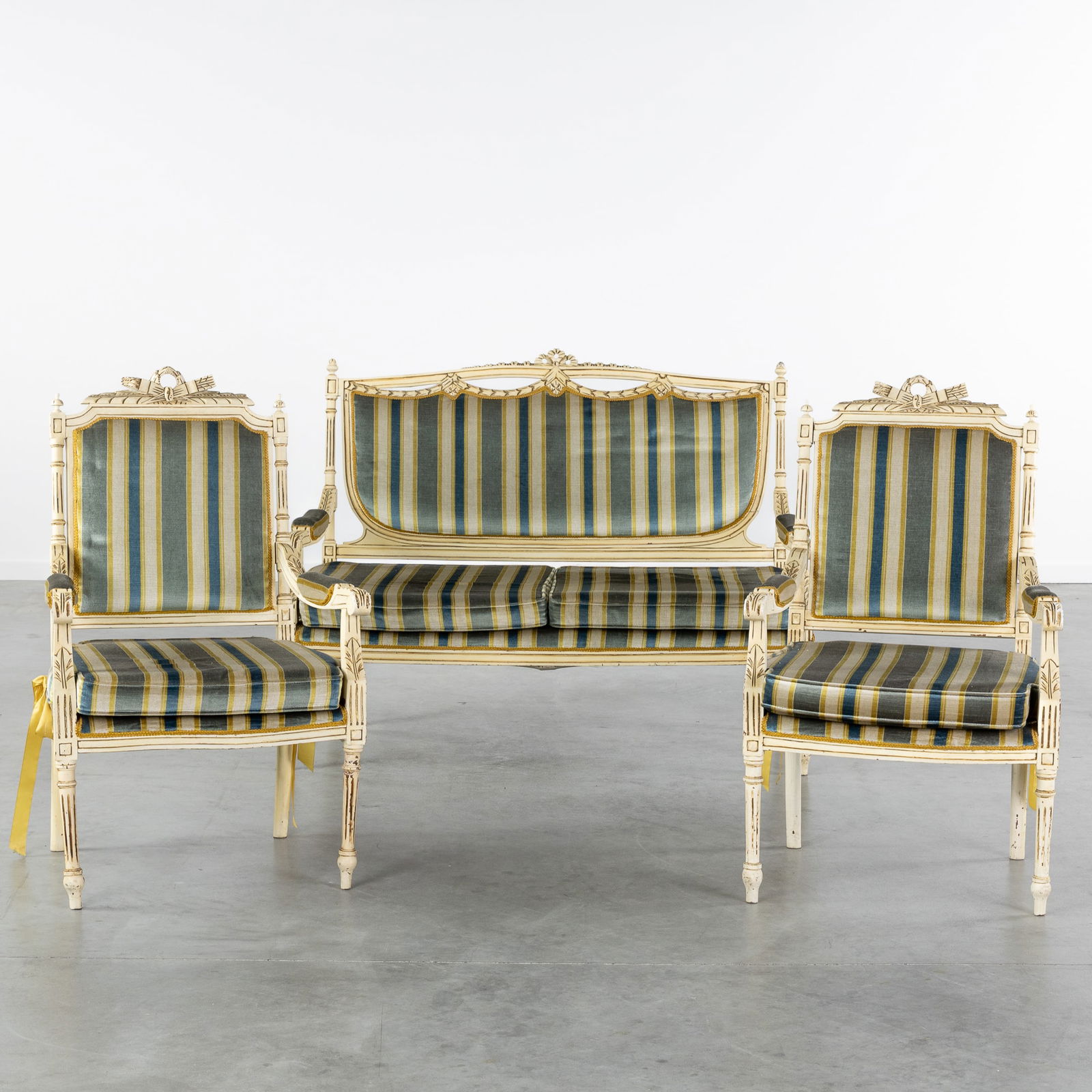 A Three-piece Salon, Sculptured and Patinated Wood, Two Armchairs and a Sofa, Louis XVI style. Circa (1 of 10)